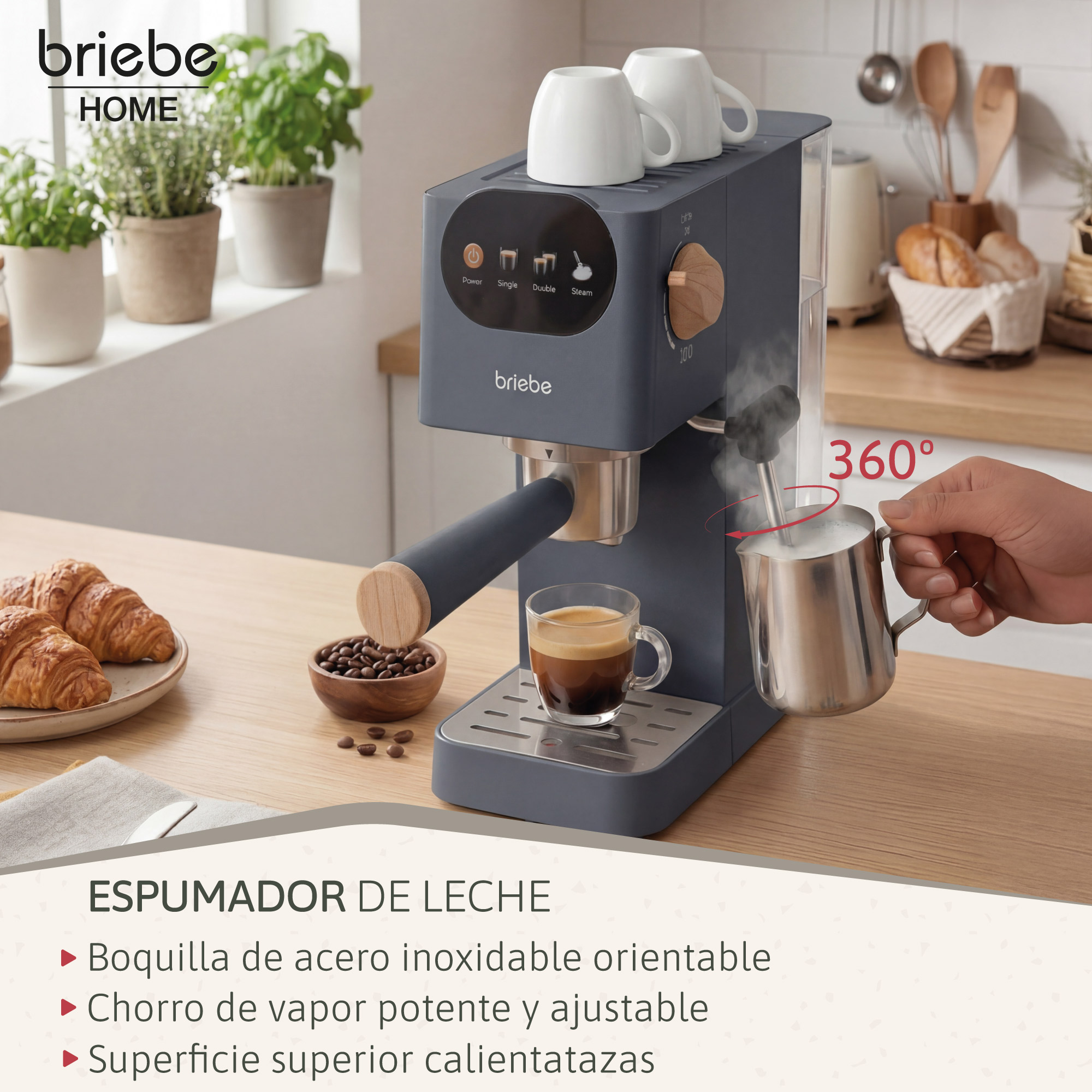 Graue Espressomaschine mit Milchaufschäumer, Tassen und Croissants.