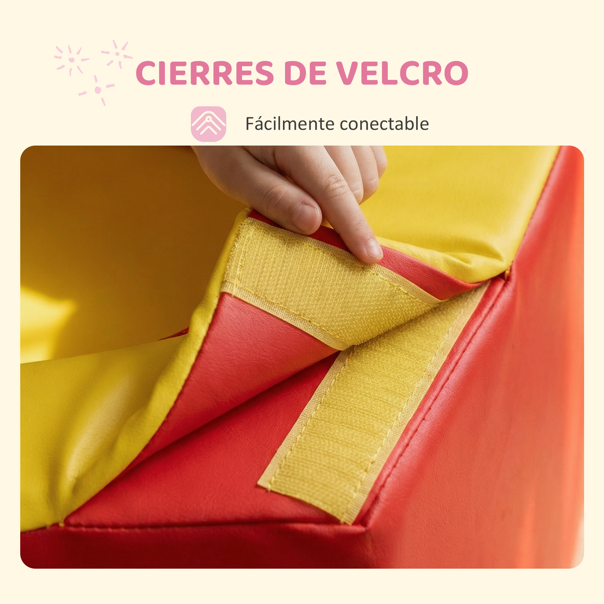 Un dedo conecta cierres de velcro en material rojo y amarillo.