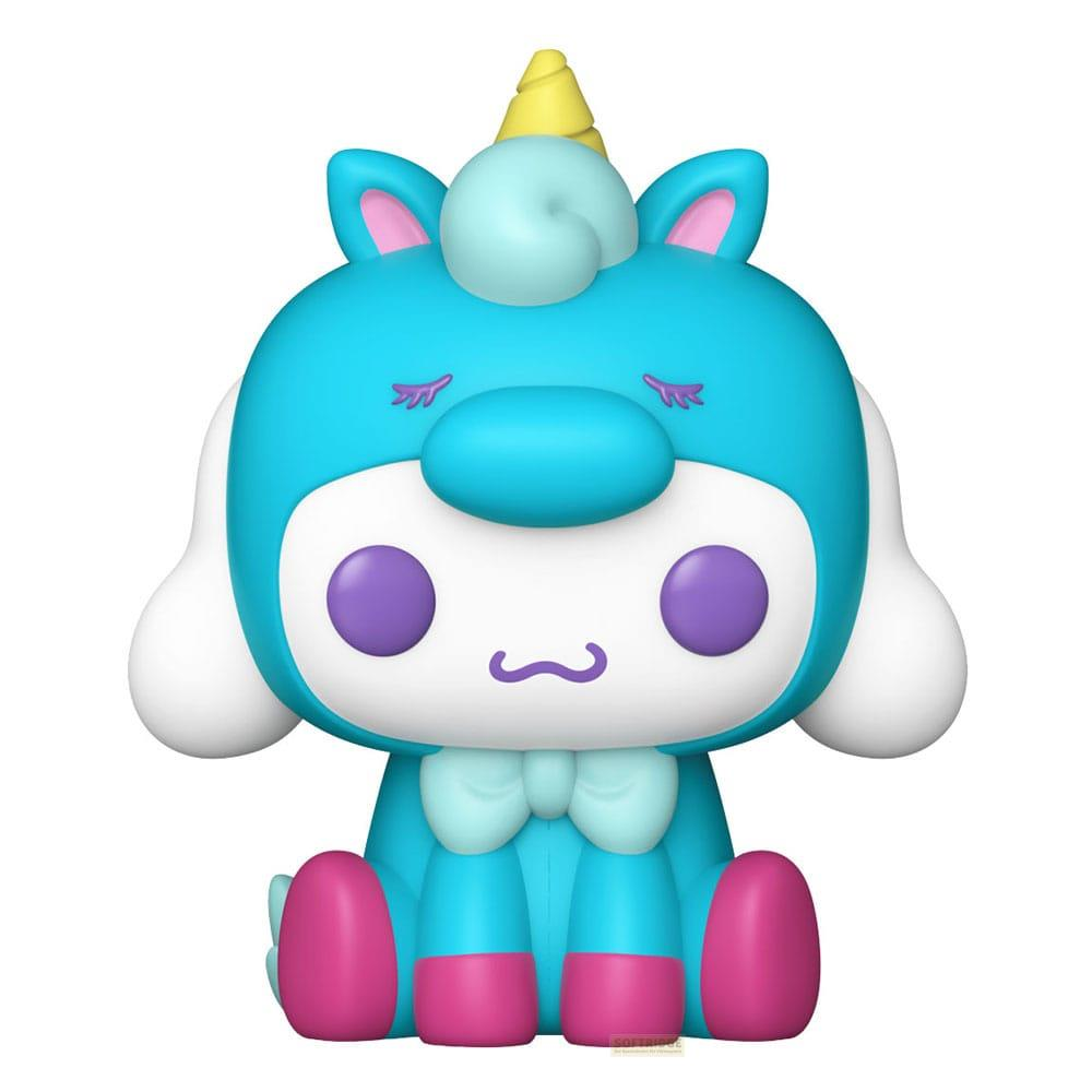Una figura de unicornio azul con ojos morados y cuerno amarillo sentada.