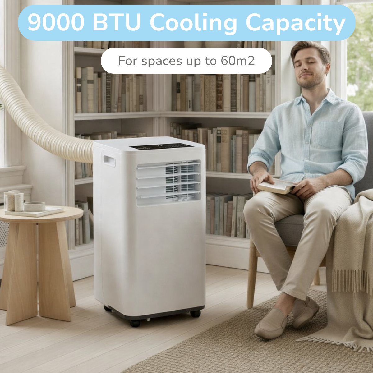 Man reads book next to portable AC unit, 9000 BTU cooling.