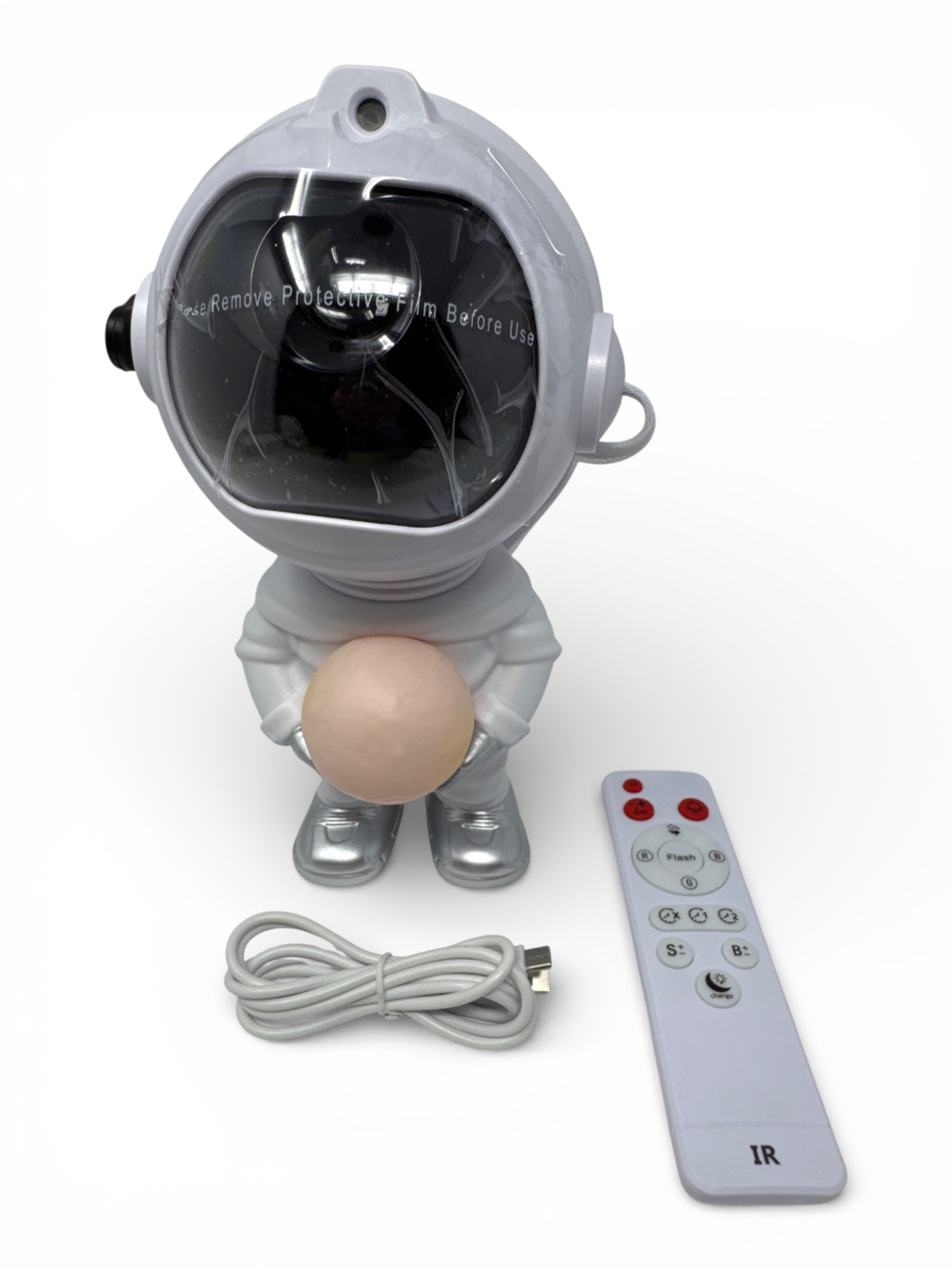 Un astronauta blanco sujetando una pelota, con un mando y cable cerca.