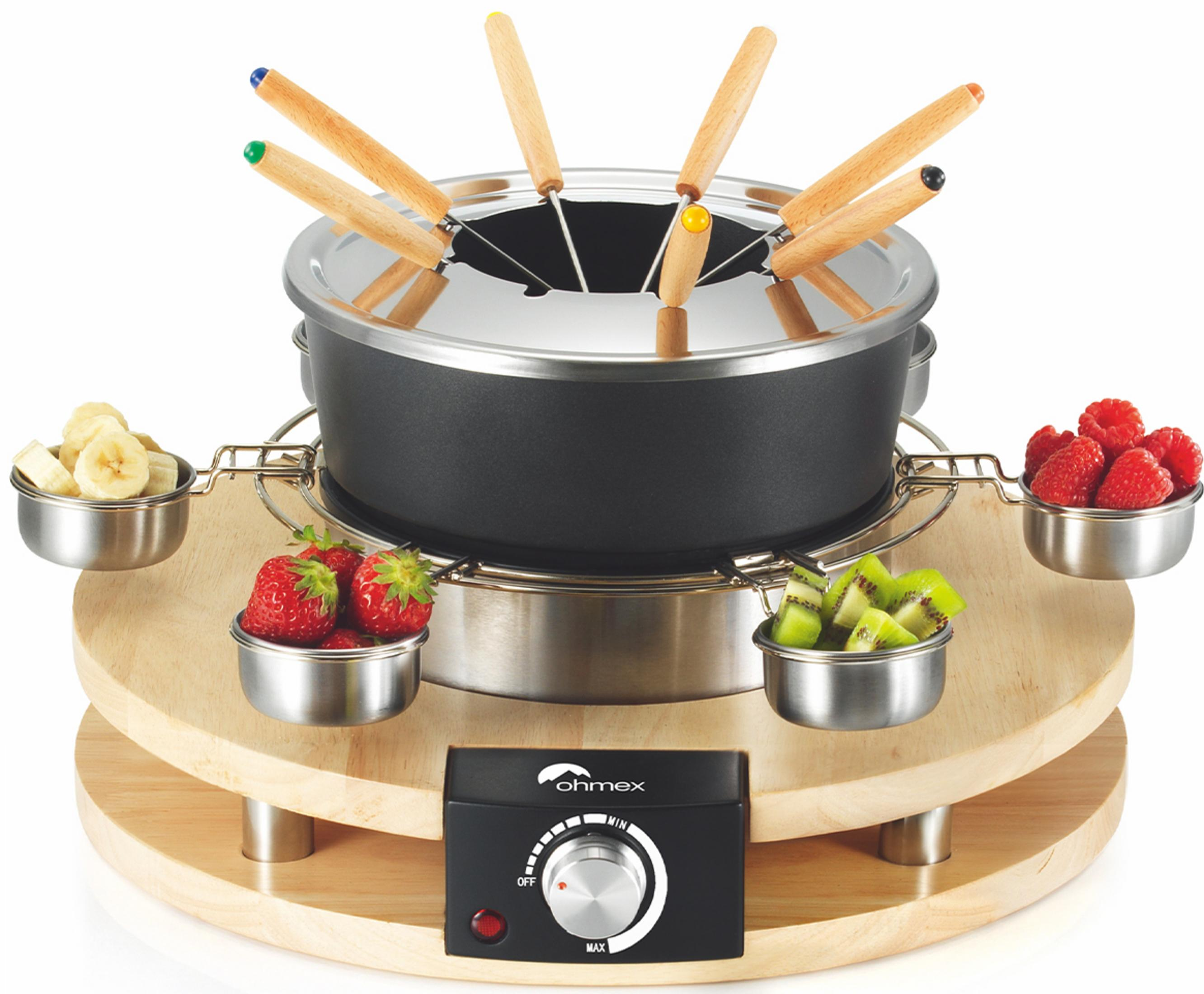 Un set da fonduta con frutta e manici in legno.