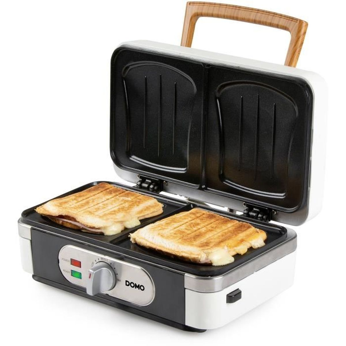 Un sandwich maker aperto con due panini dorati che mostrano formaggio fuso.