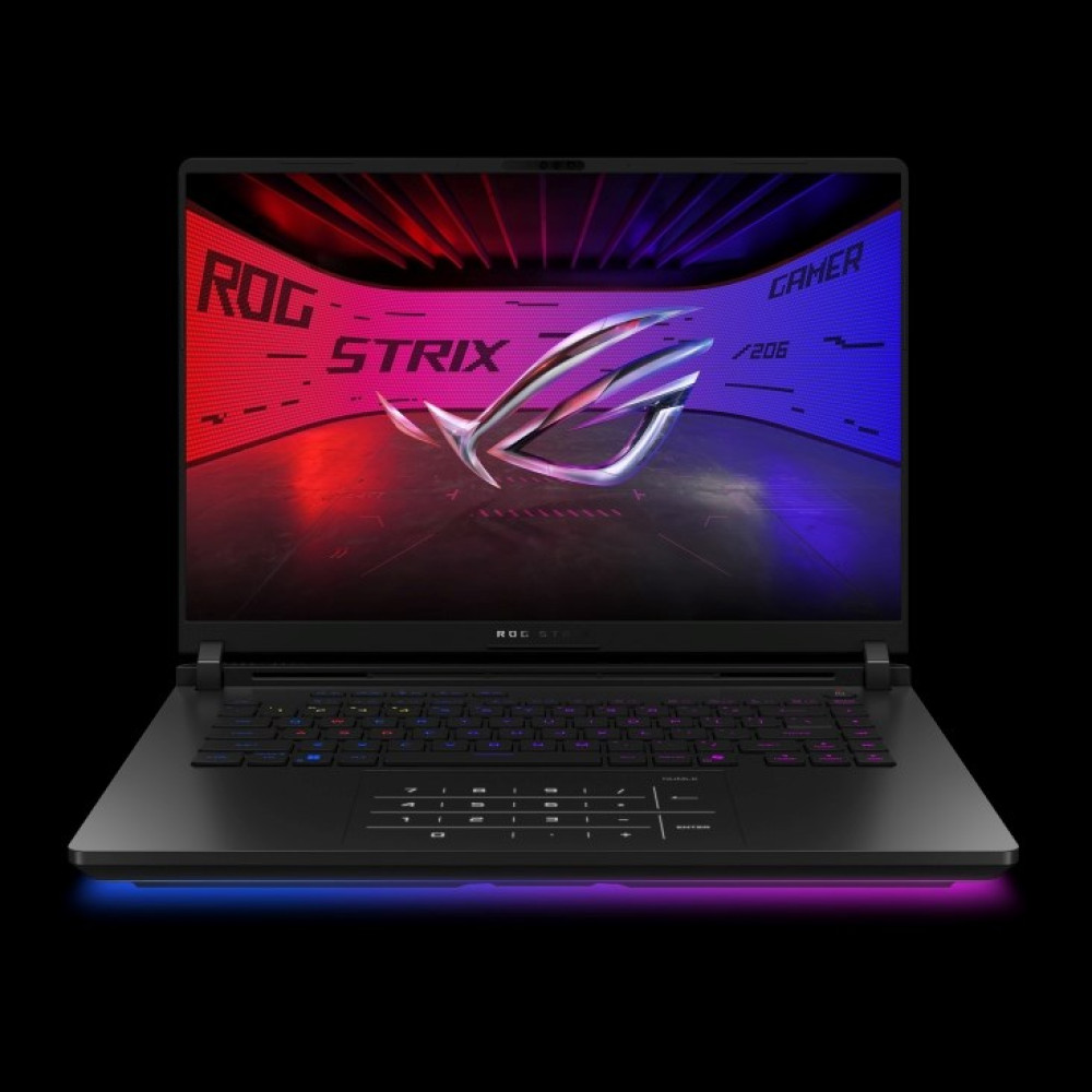 Czarny laptop gamingowy z podświetlaną klawiaturą i logo ROG na ekranie.