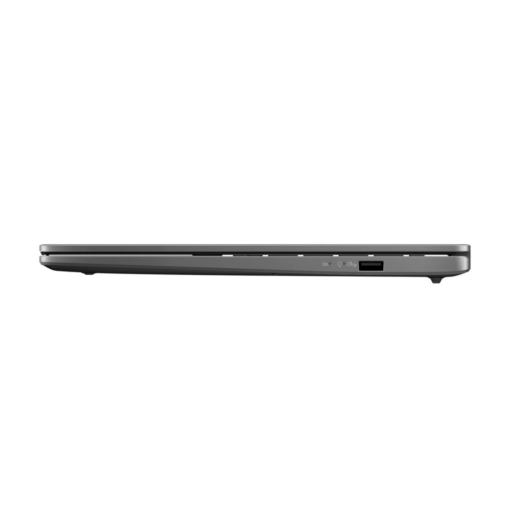 Widok z boku szarego laptopa, pokazujący porty USB i gniazdo karty SD.