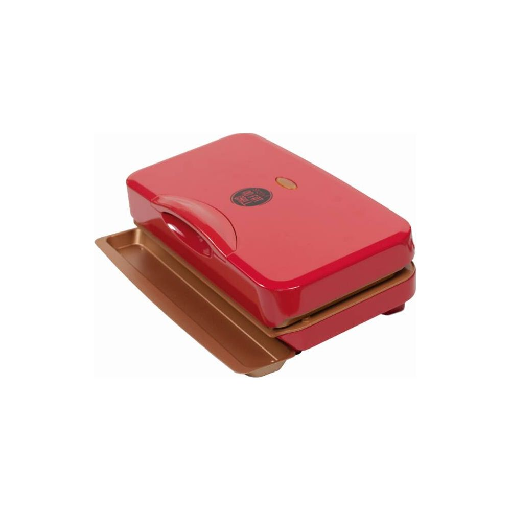 Una bistecchiera rossa con vaschetta raccogligocce color rame.