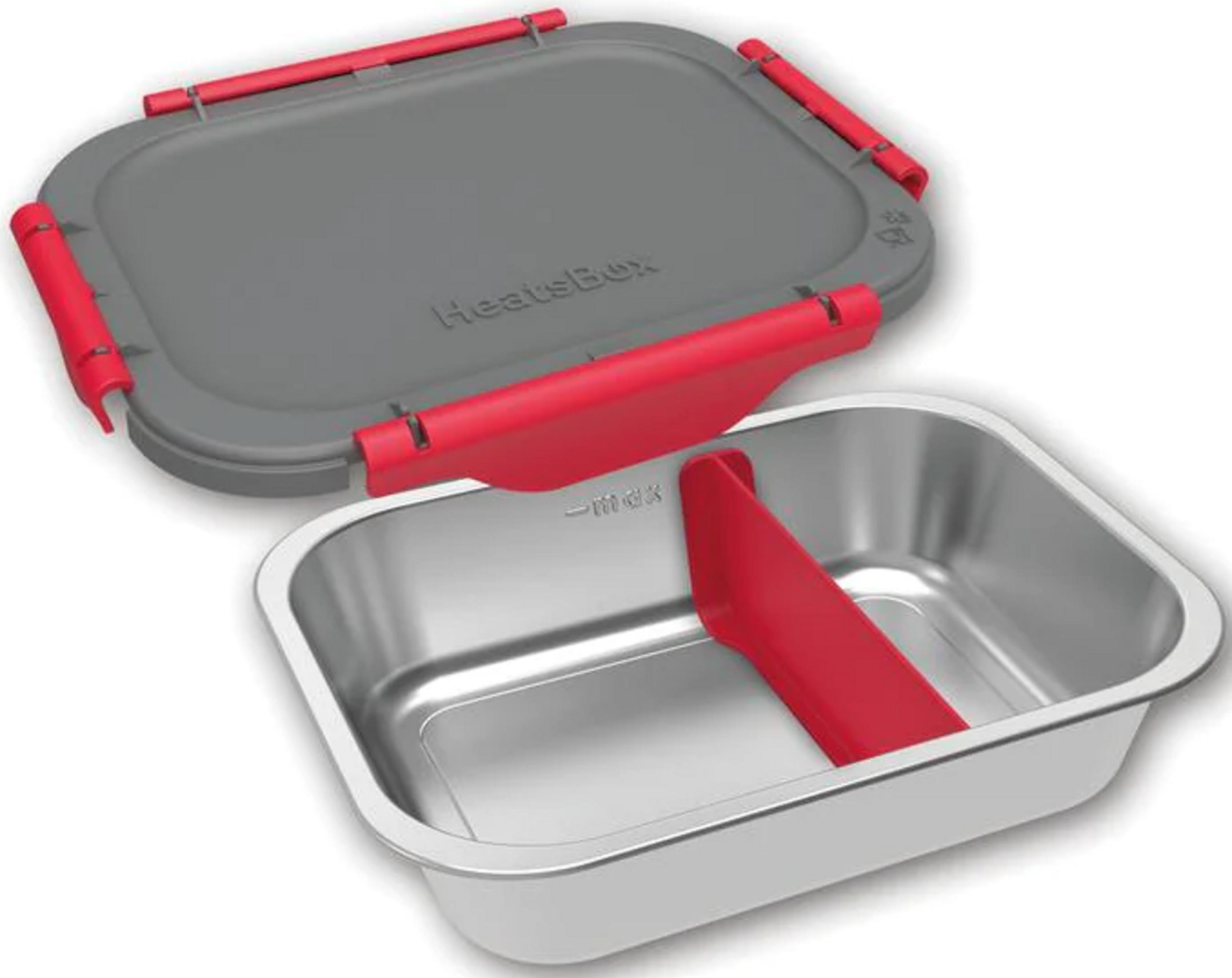 Grauer Deckel mit roten Griffen über einer Metallschale mit rotem Einsatz.