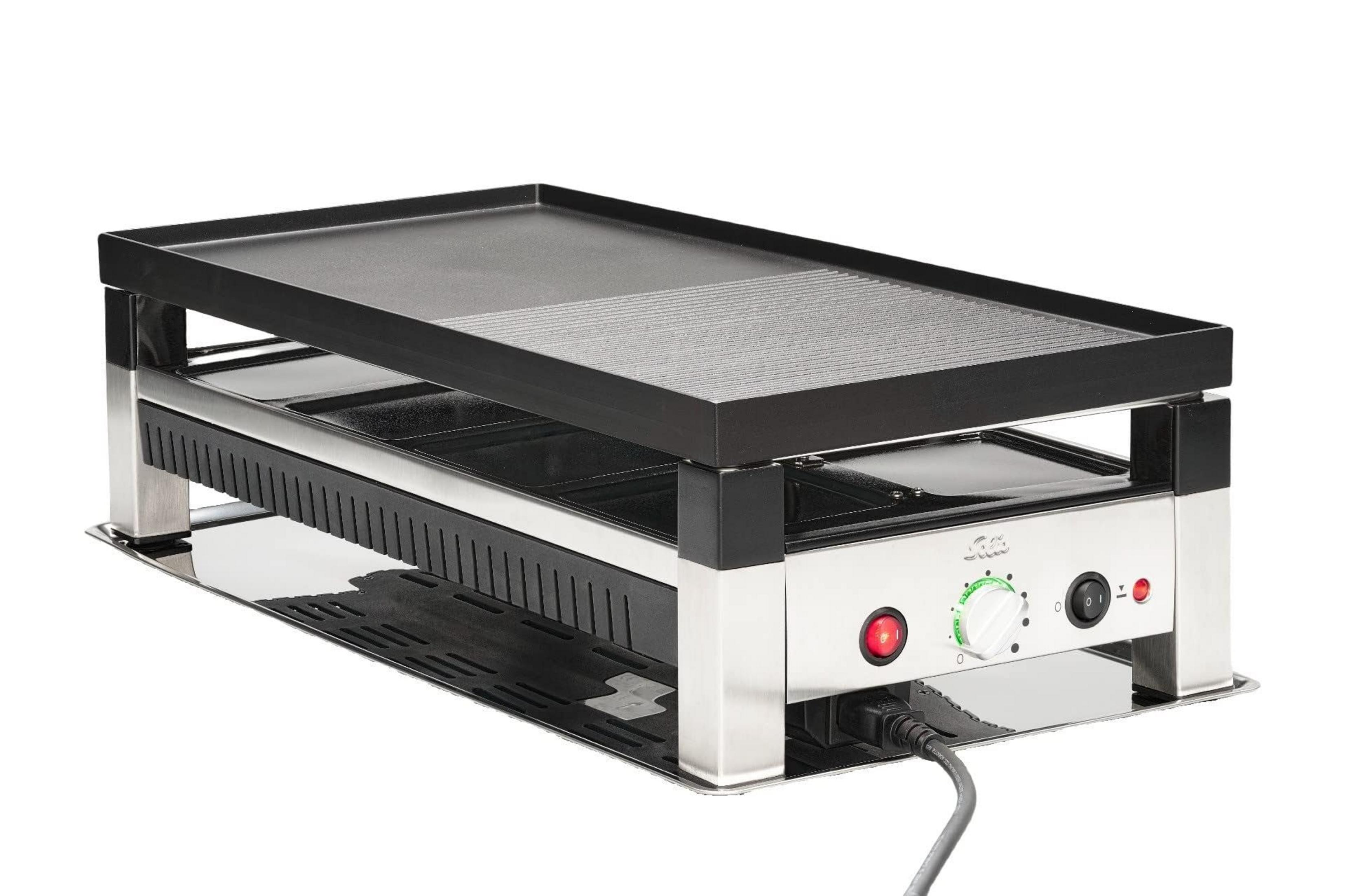 Una griglia per raclette con piastra grill nera ed elementi in acciaio inox.
