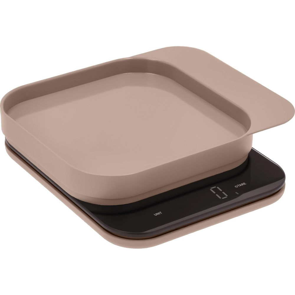 Una bilancia da cucina moderna con display digitale e superficie di pesata piatta e beige.