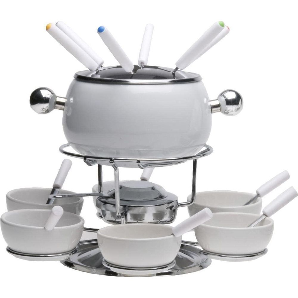 Ein weißes Fondue-Set mit sechs Gabeln und sechs Schalen auf einem Chromständer.