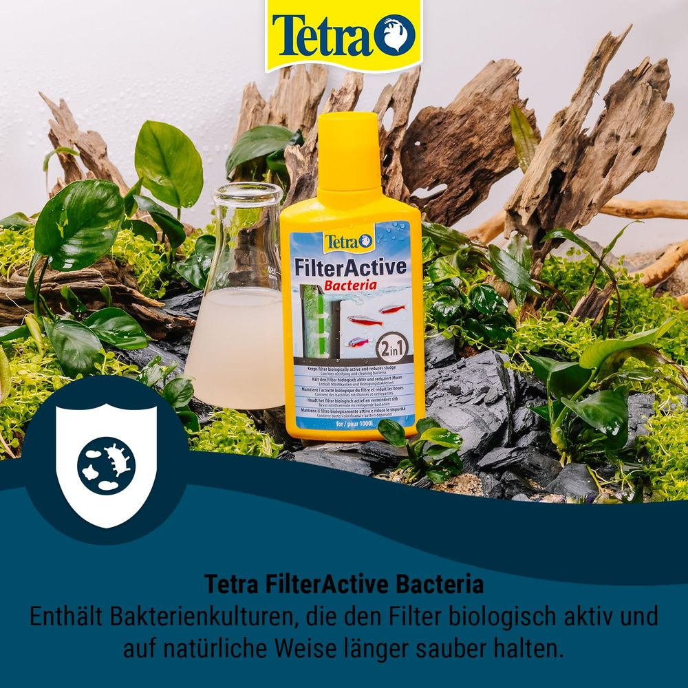 Bottiglia e becher Tetra FilterActive Bacteria in decorazione acquario.