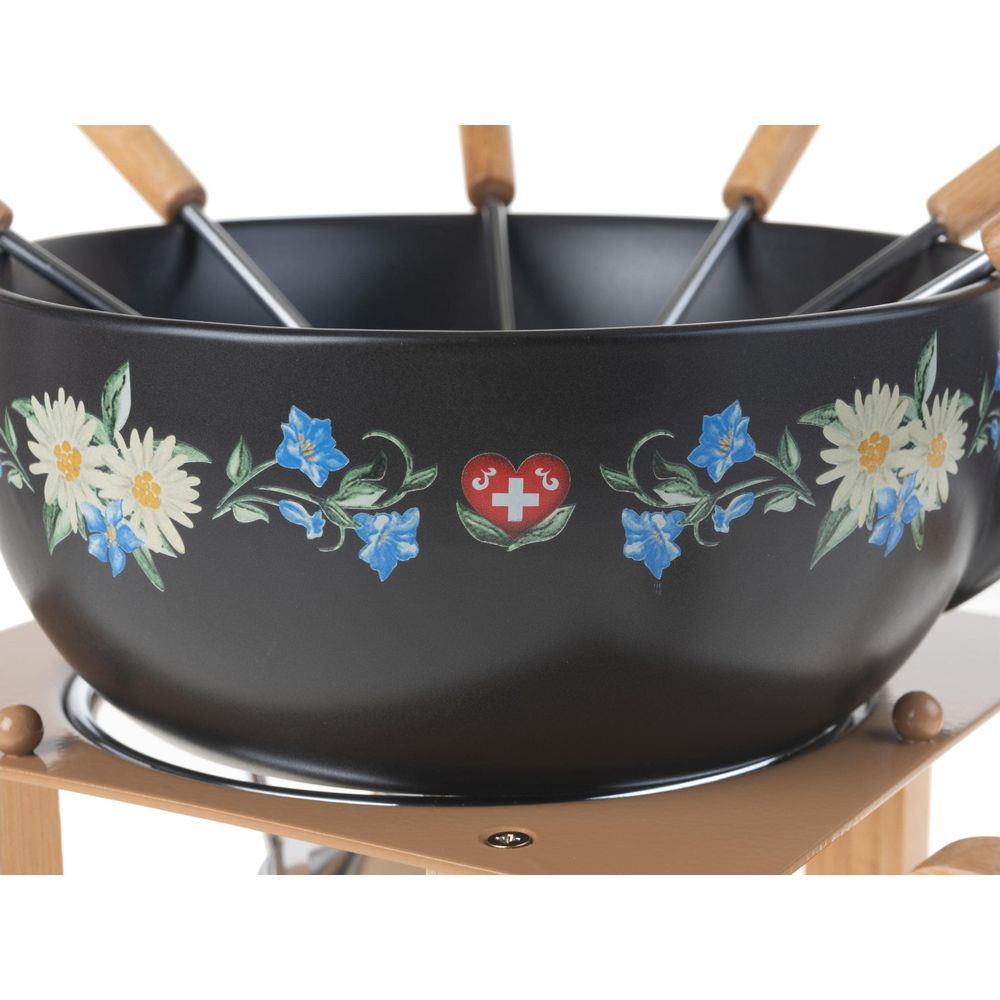Schwarze Fondue-Schüssel mit Blumenmuster, Schweizer Kreuz im Herz-Symbol.