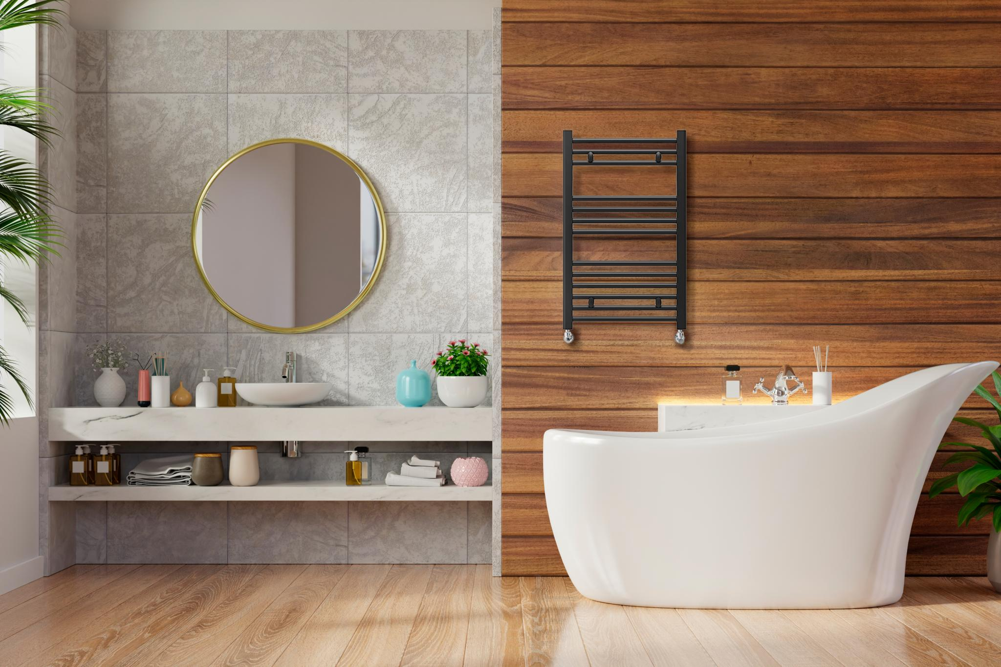 Baño moderno con bañera exenta, tocador y pared de acento de madera.