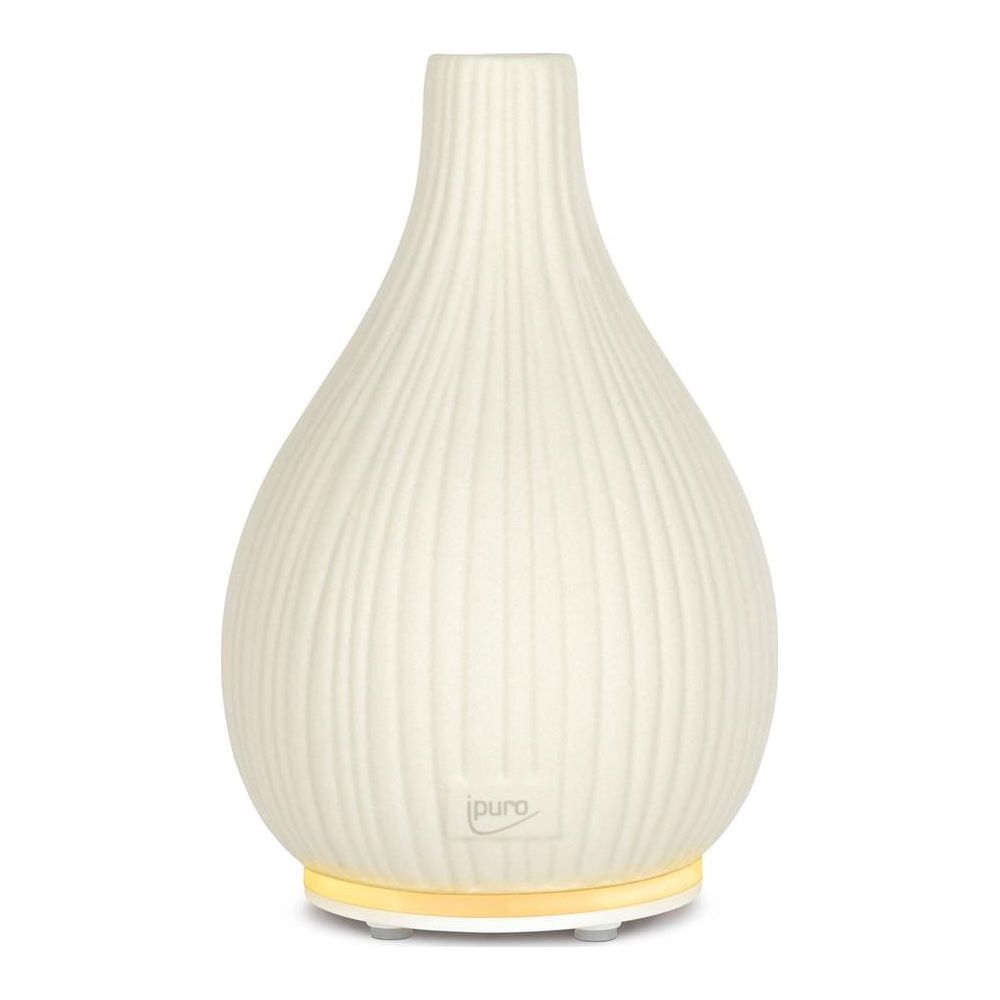 Un vaso bianco scanalato con collo stretto e base illuminata.