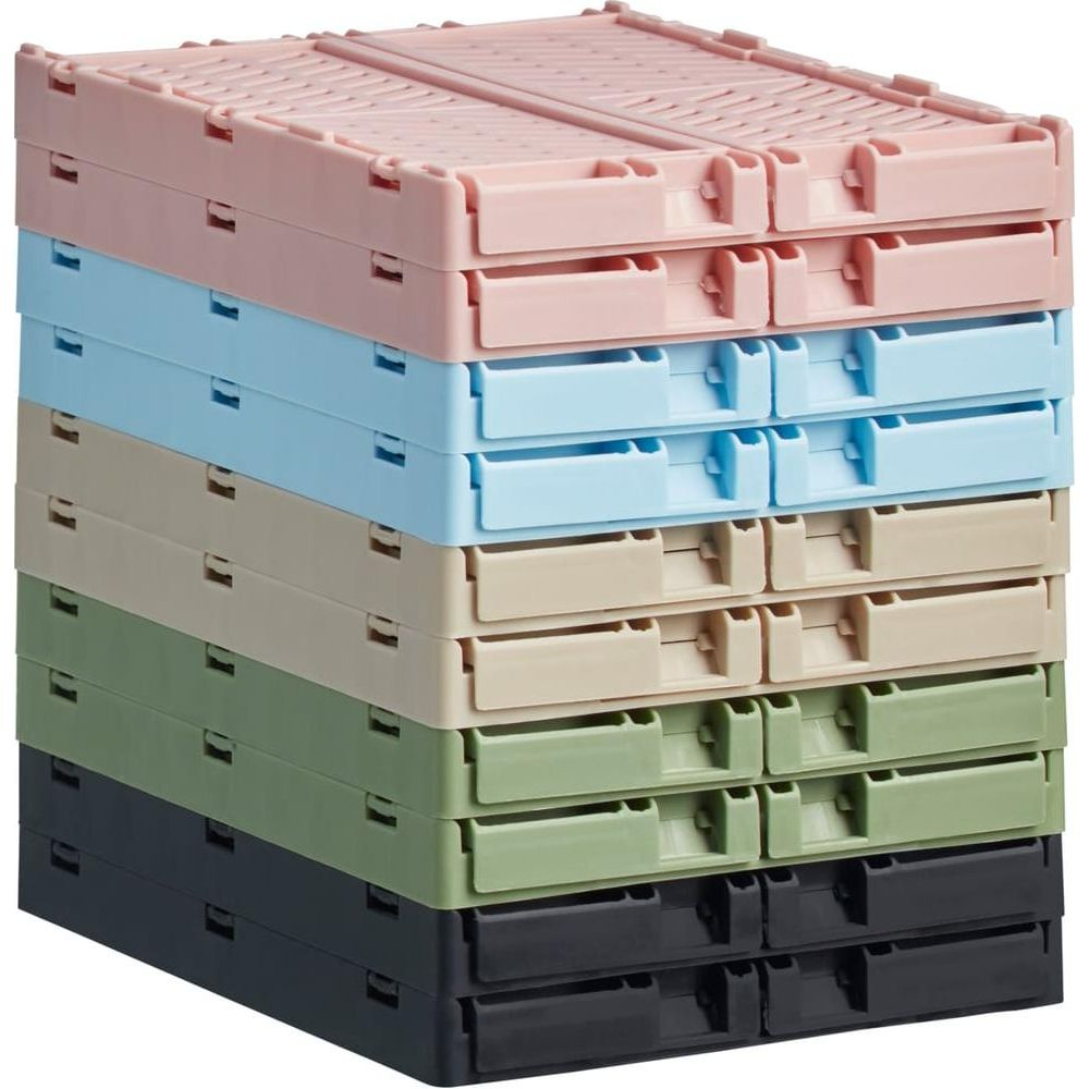 Stapel aus sechs faltbaren Kunststoffboxen in Rosa, Hellblau, Beige, Grün und Schwarz.