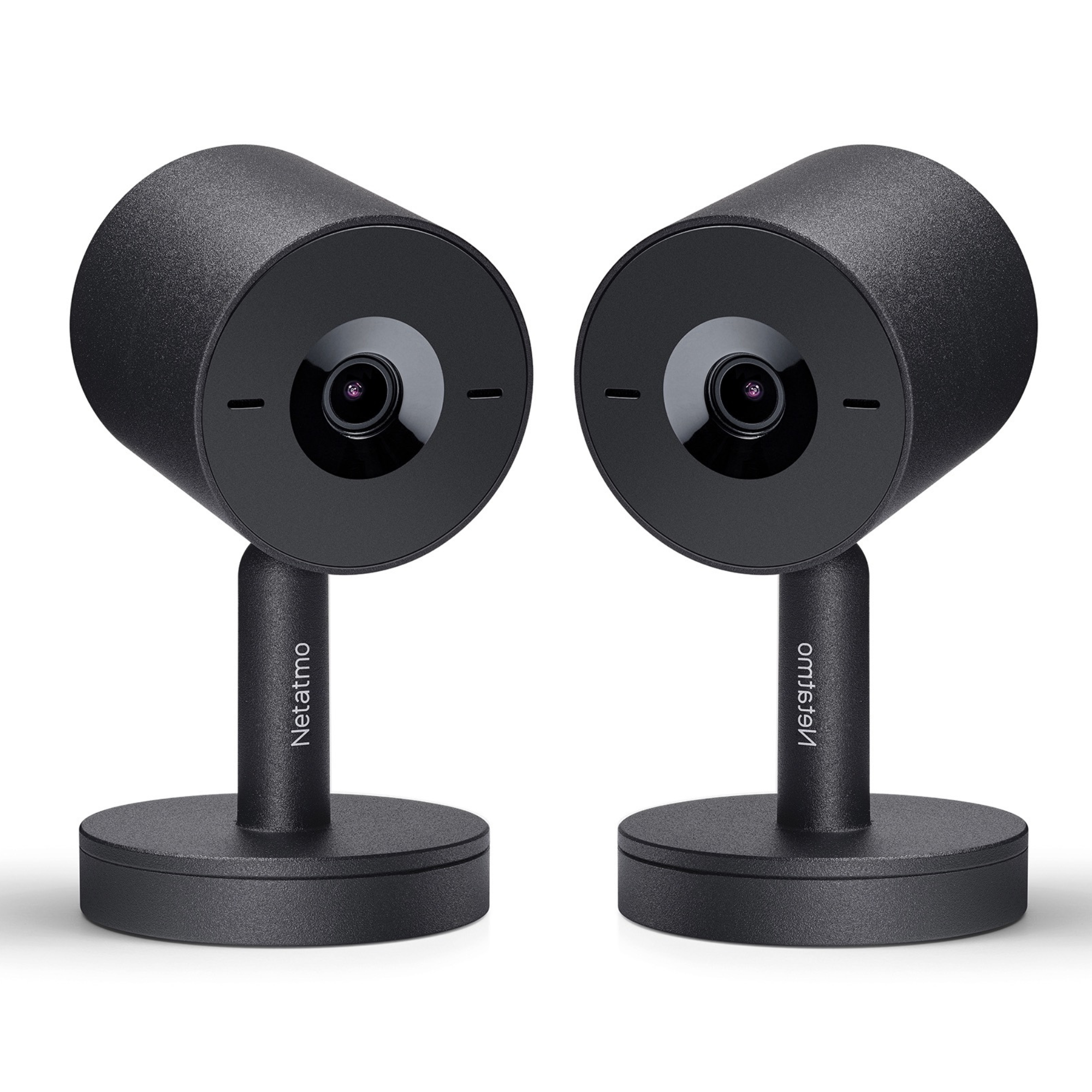 Deux caméras Netatmo noires avec bases rondes et pieds sur fond blanc.