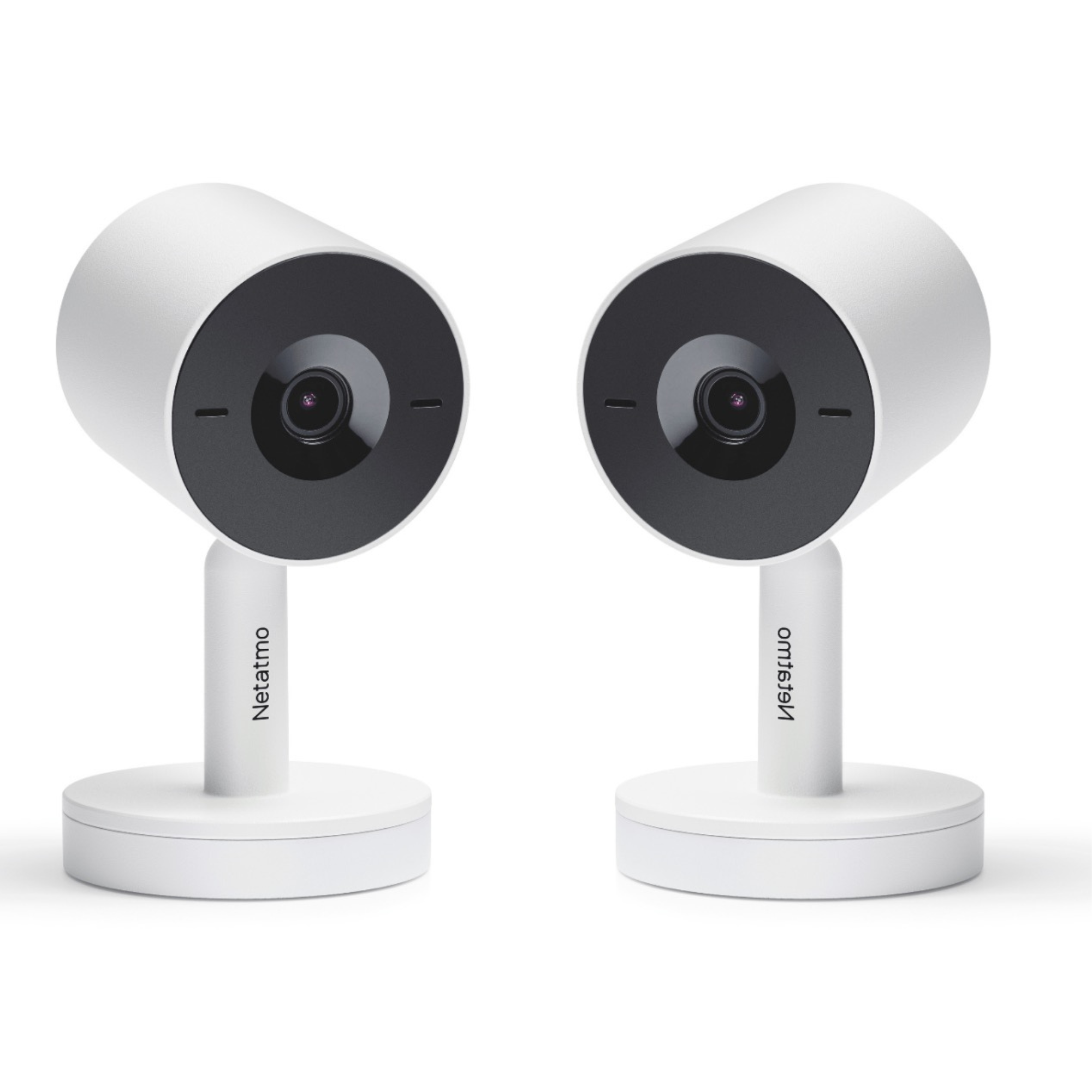 Deux caméras Netatmo blanches avec façades et objectifs noirs.