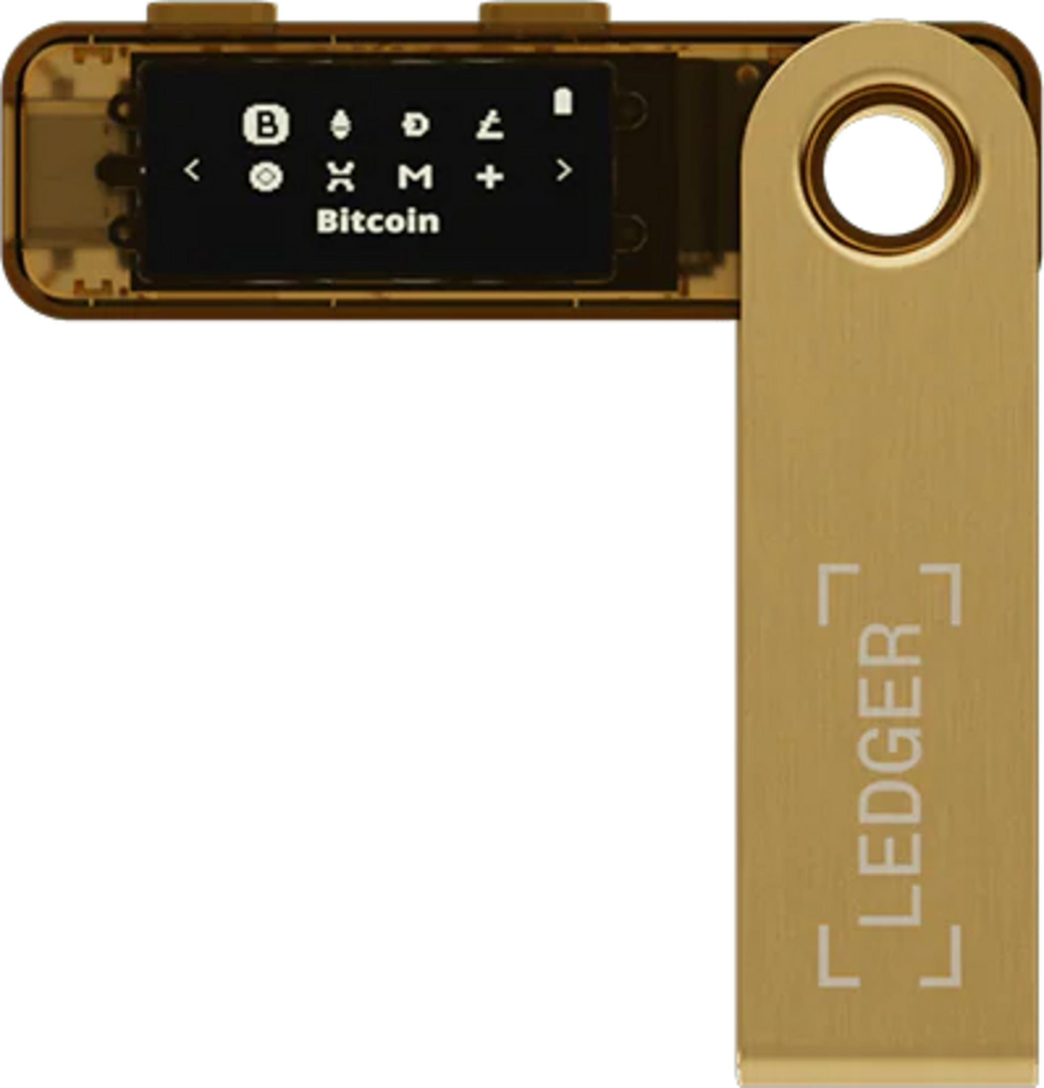 Złoty portfel sprzętowy Ledger Nano S do kryptowalut, z ekranem wyświetlającym „Bitcoin” i różne ikony.