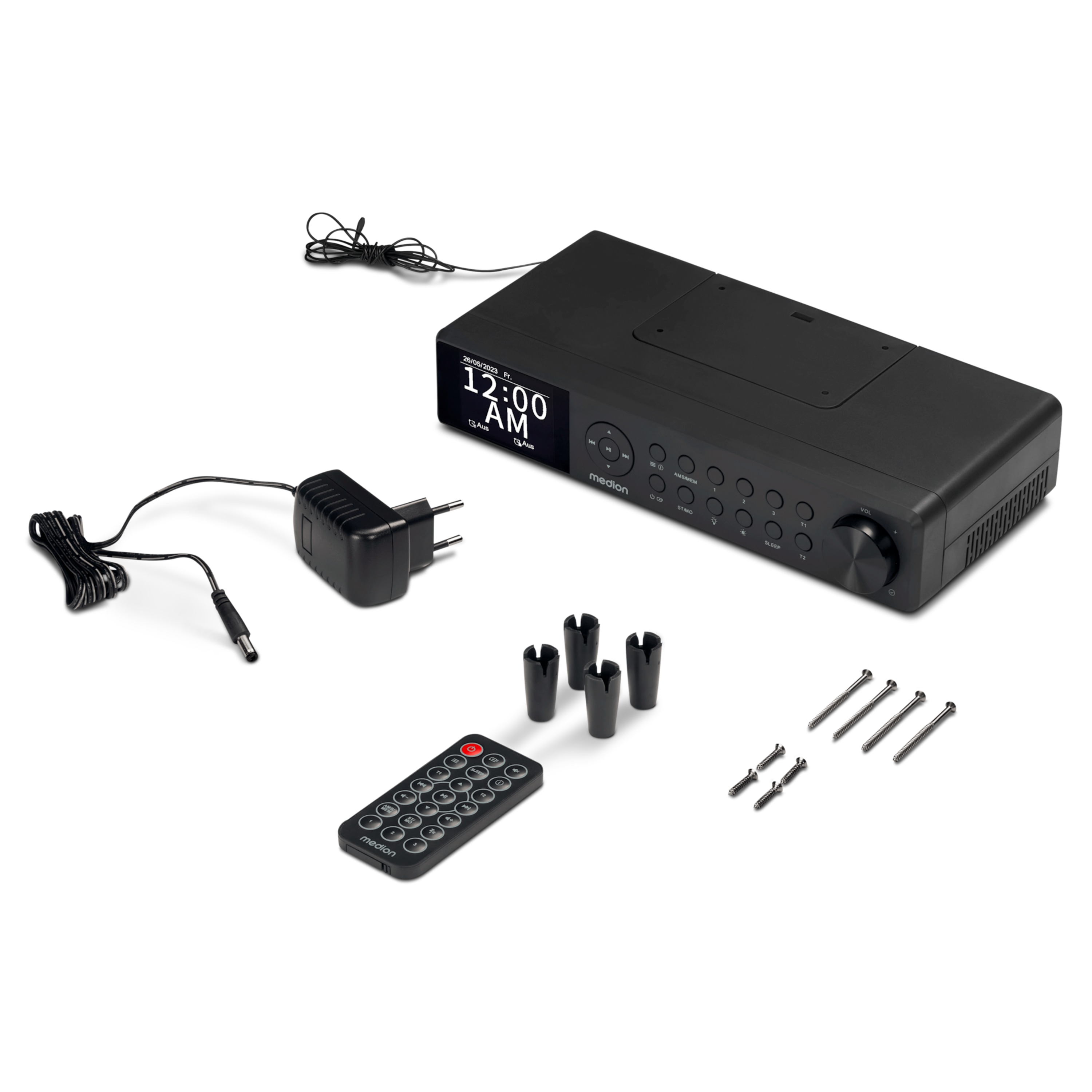 A black alarm clock radio with remote, power adapter, four feet, and screws.