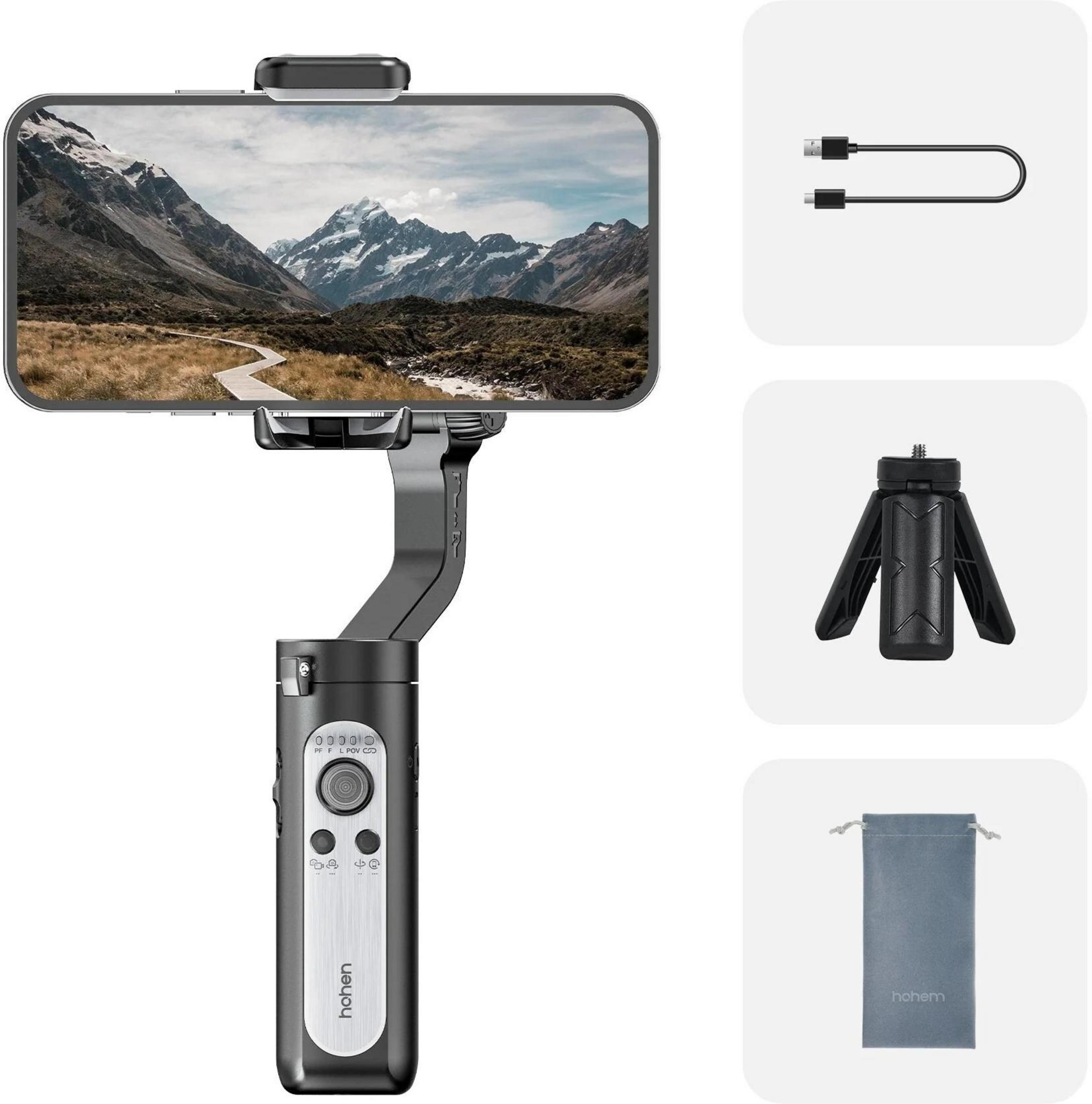 Stabilisateur de smartphone avec paysage de montagne à l'écran, accessoires à côté.