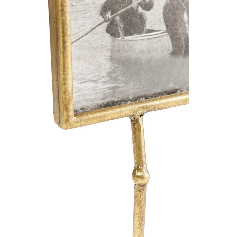 Cadre doré avec photo vintage de personnes en canoë sur l'eau.