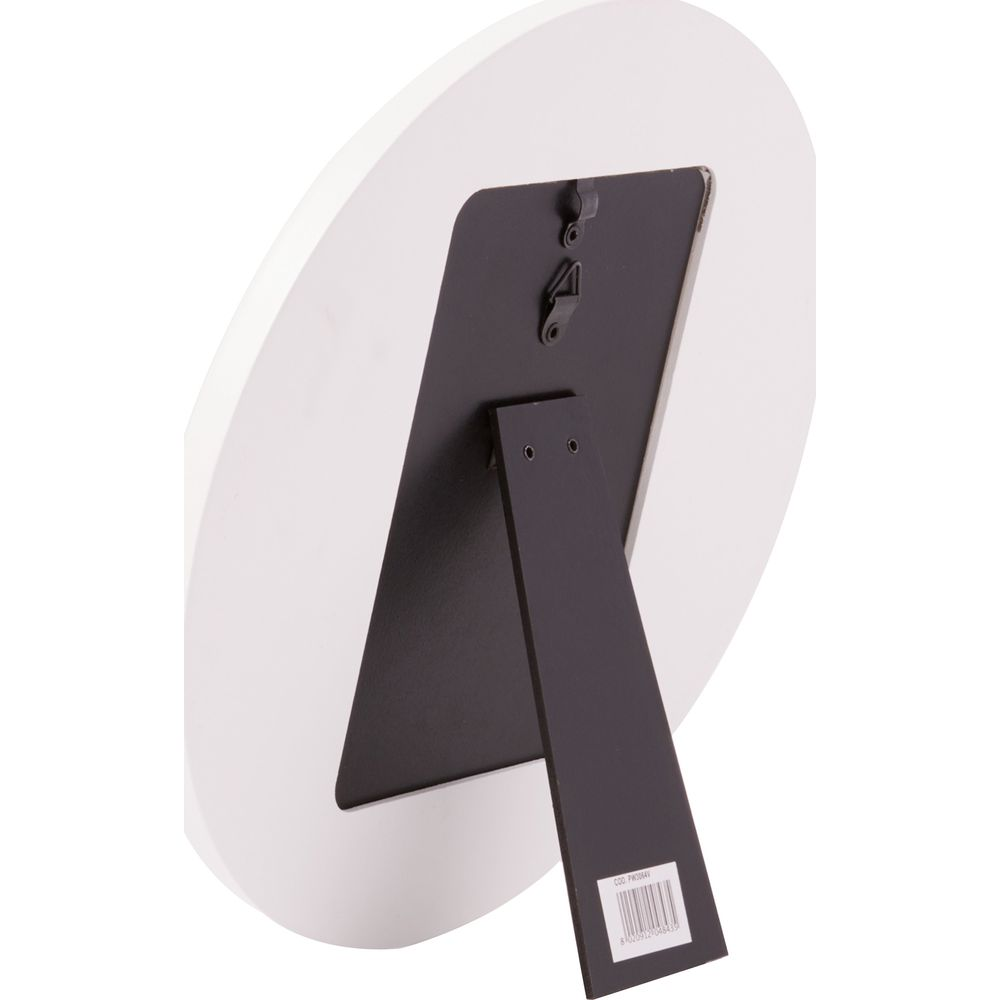 L'arrière d'un cadre photo ovale blanc avec un support noir.