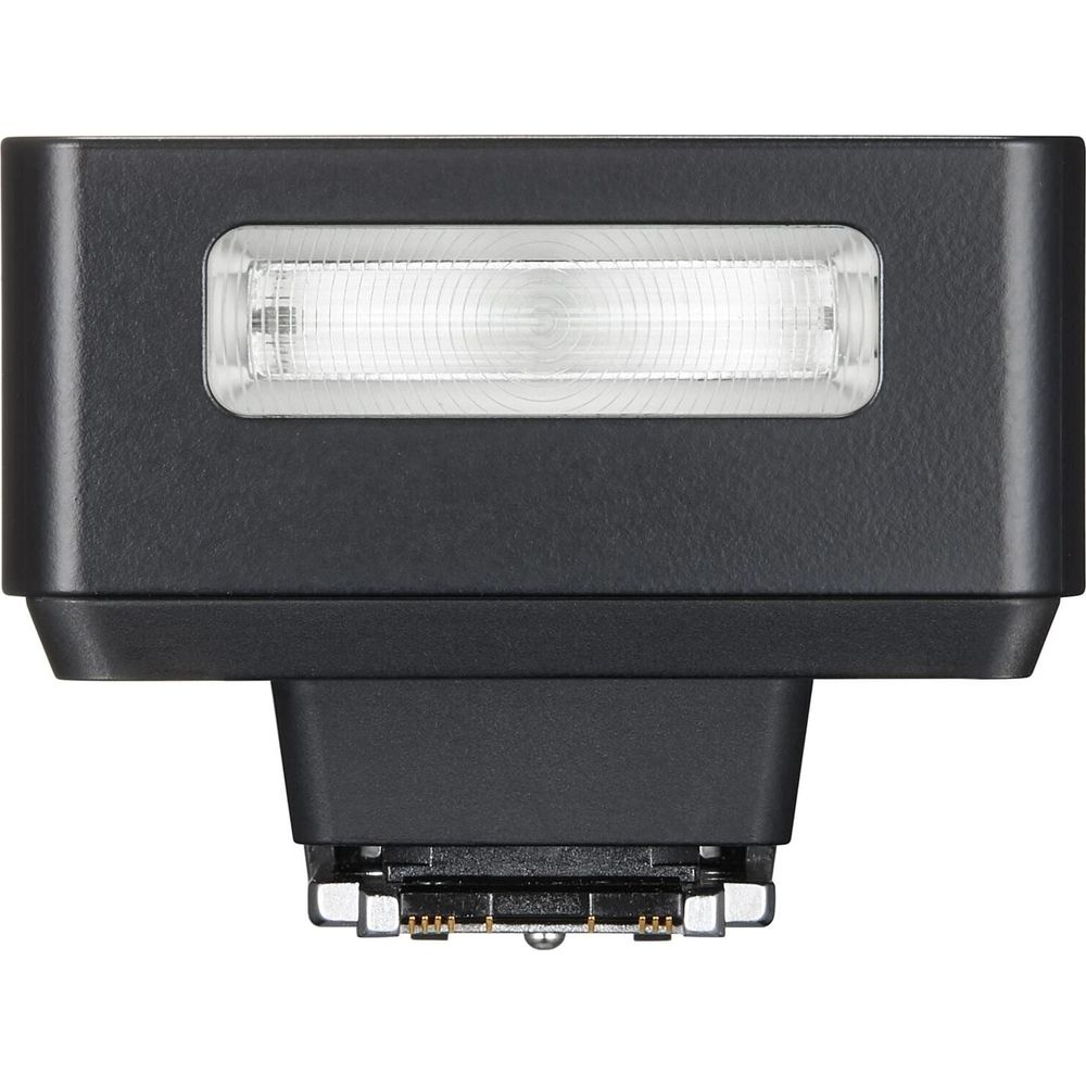 Unité de flash noir pour appareil photo avec élément lumineux visible et contacts métalliques.