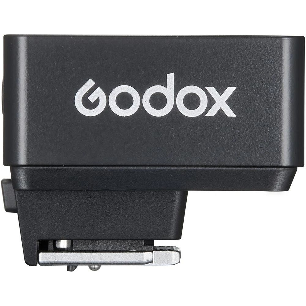 Déclencheur flash Godox noir avec logo blanc, monture métal.