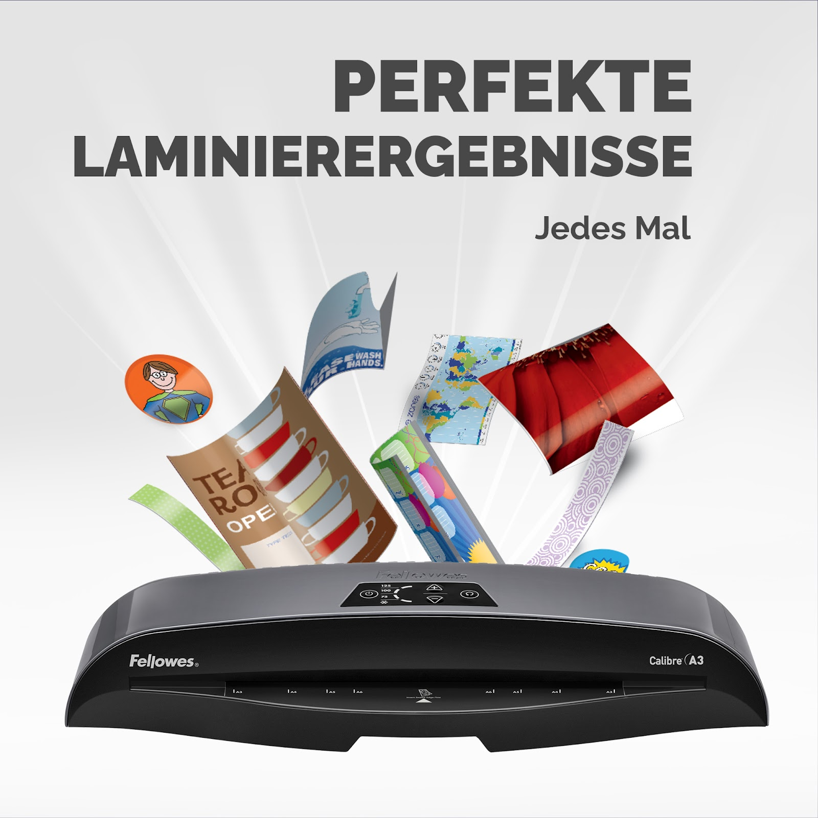 Laminator Fellowes z różnymi laminowanymi dokumentami, mapami i zdjęciami.
