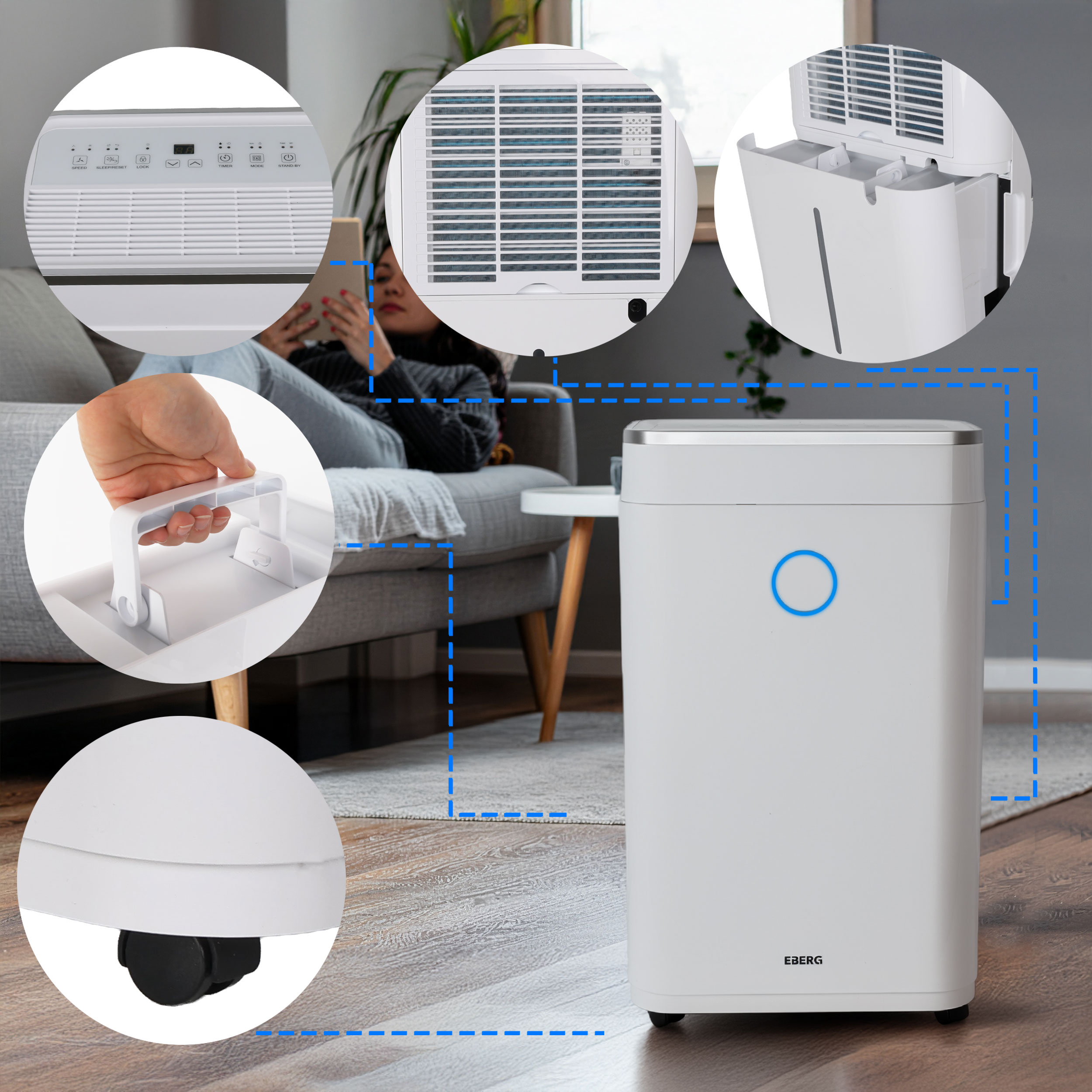 Biały osuszacz powietrza z niebieskimi akcentami stoi na drewnianej podłodze.