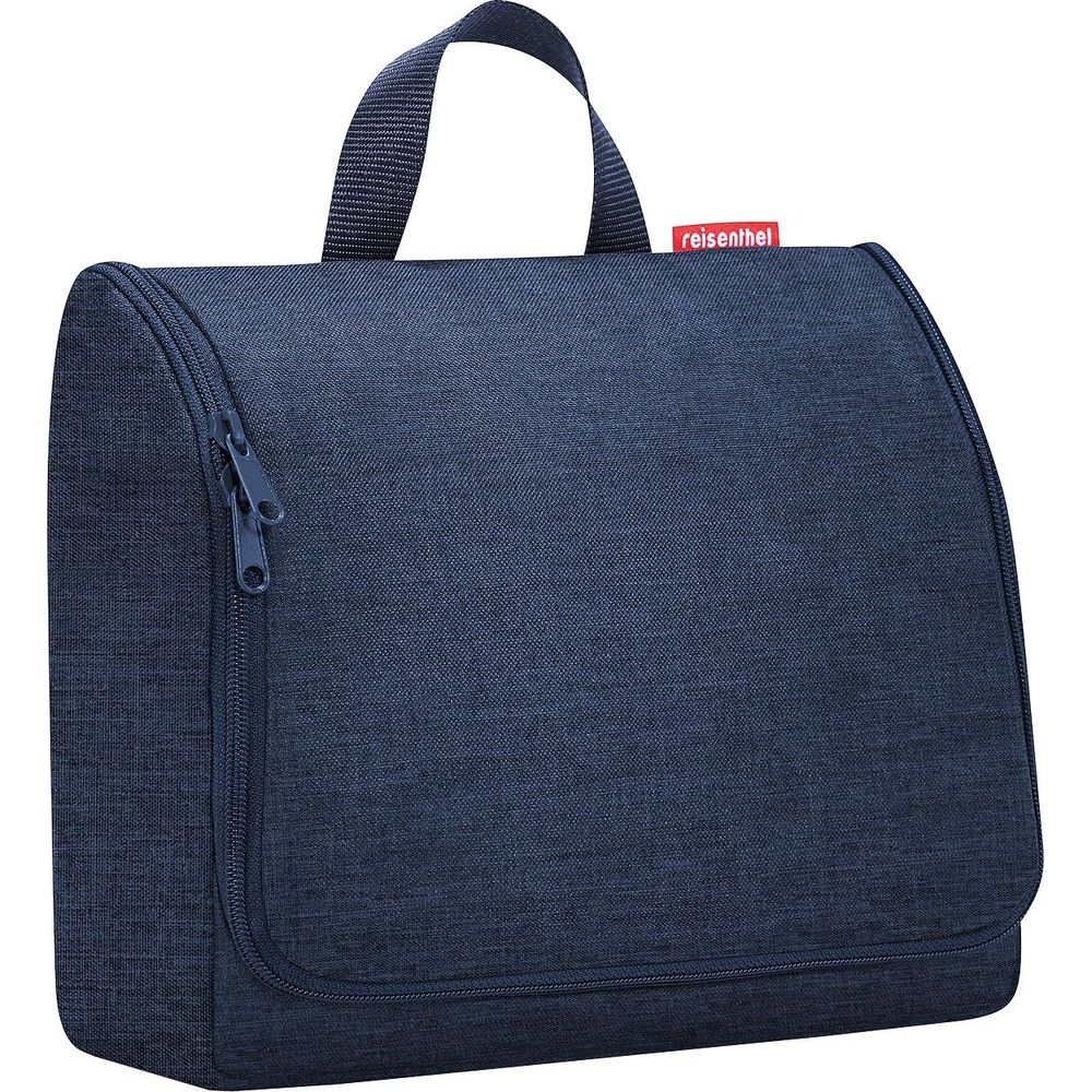Dunkelblaue Kulturtasche mit Reißverschluss und Henkel.
