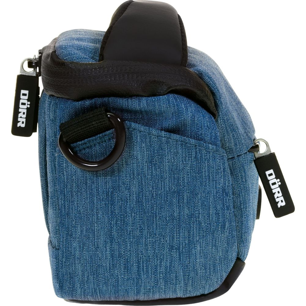 Una borsa fotografica in denim blu con tracolla nera e cerniere DÖRR.