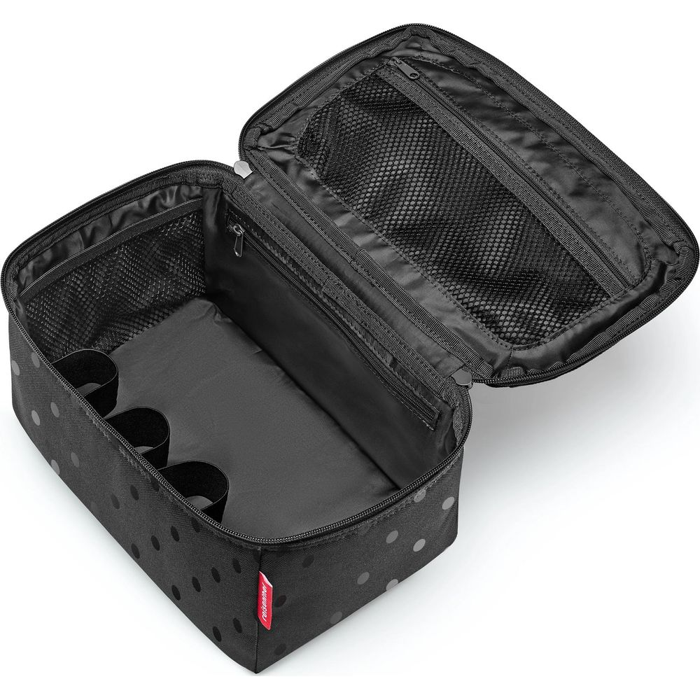 Schwarze Kosmetiktasche mit Punkten, offen, mit Innenfächern und Netz.