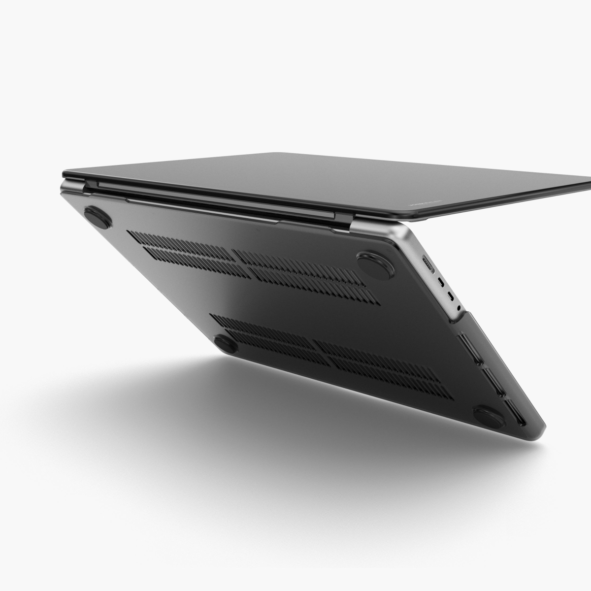 Ein schwarzer Laptop ist auf einem weißen Hintergrund zu sehen, von unten.