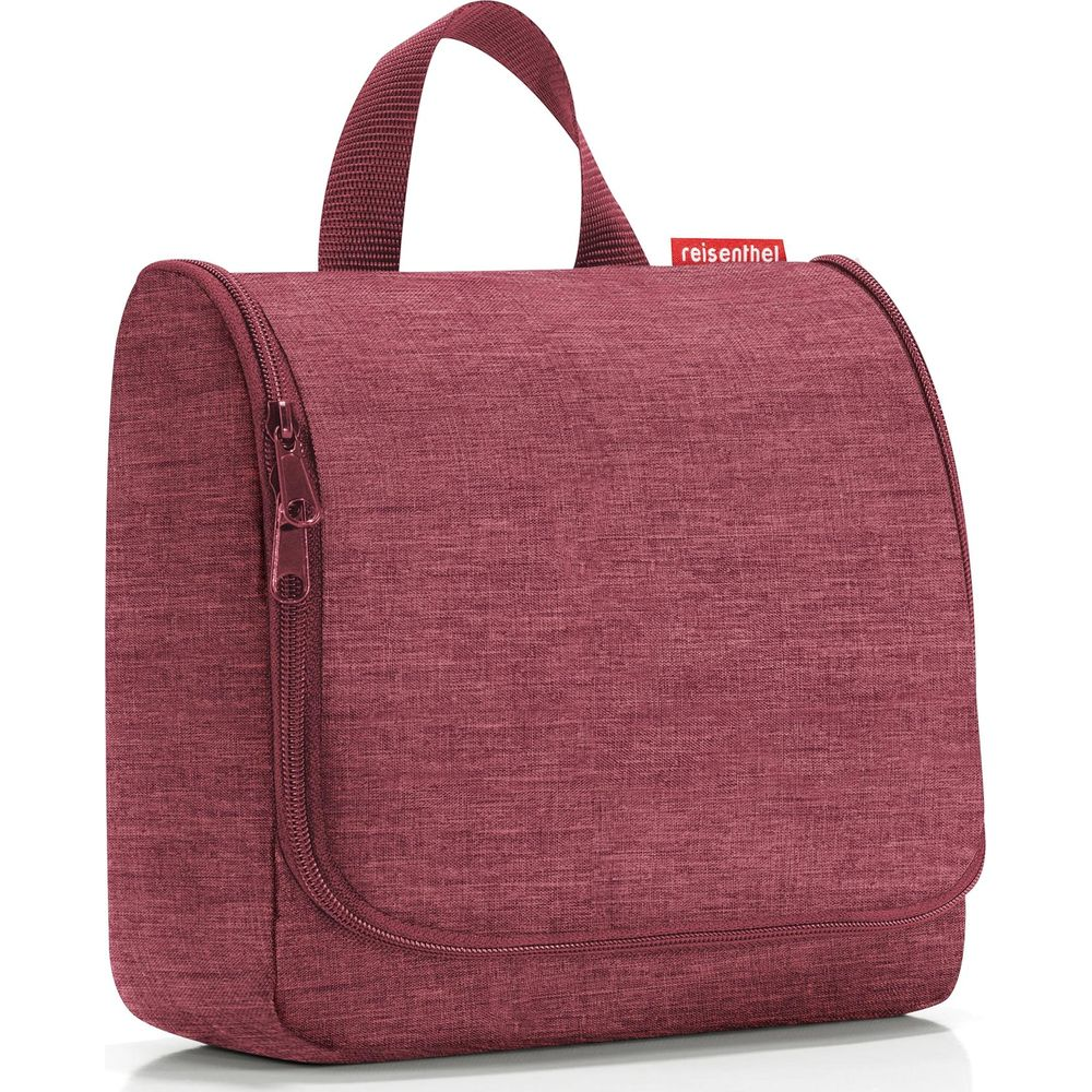Un beauty case color bordeaux con cerniera e manico.