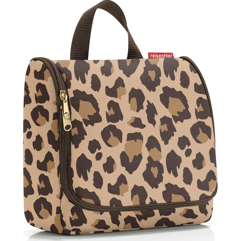 Beauty case marrone con stampa leopardata e chiusura a zip.