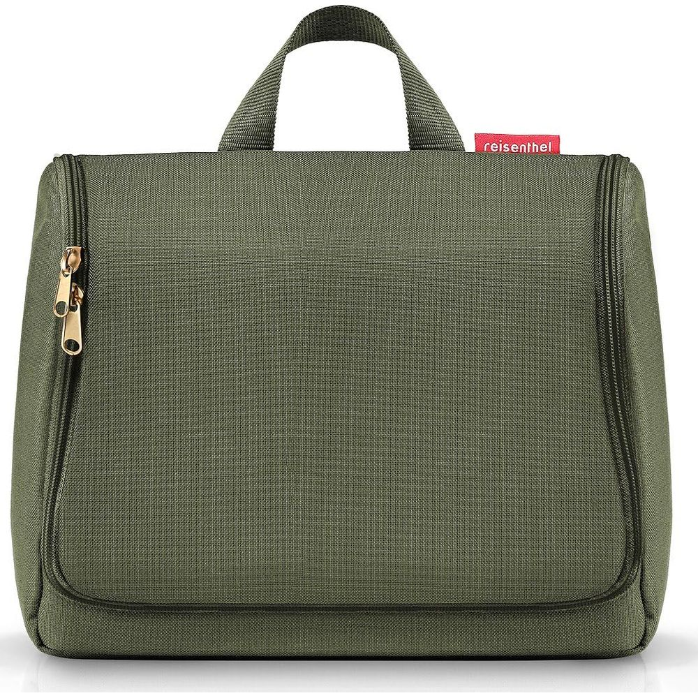 Eine olivgrüne Kulturtasche mit Reißverschluss und Henkel.