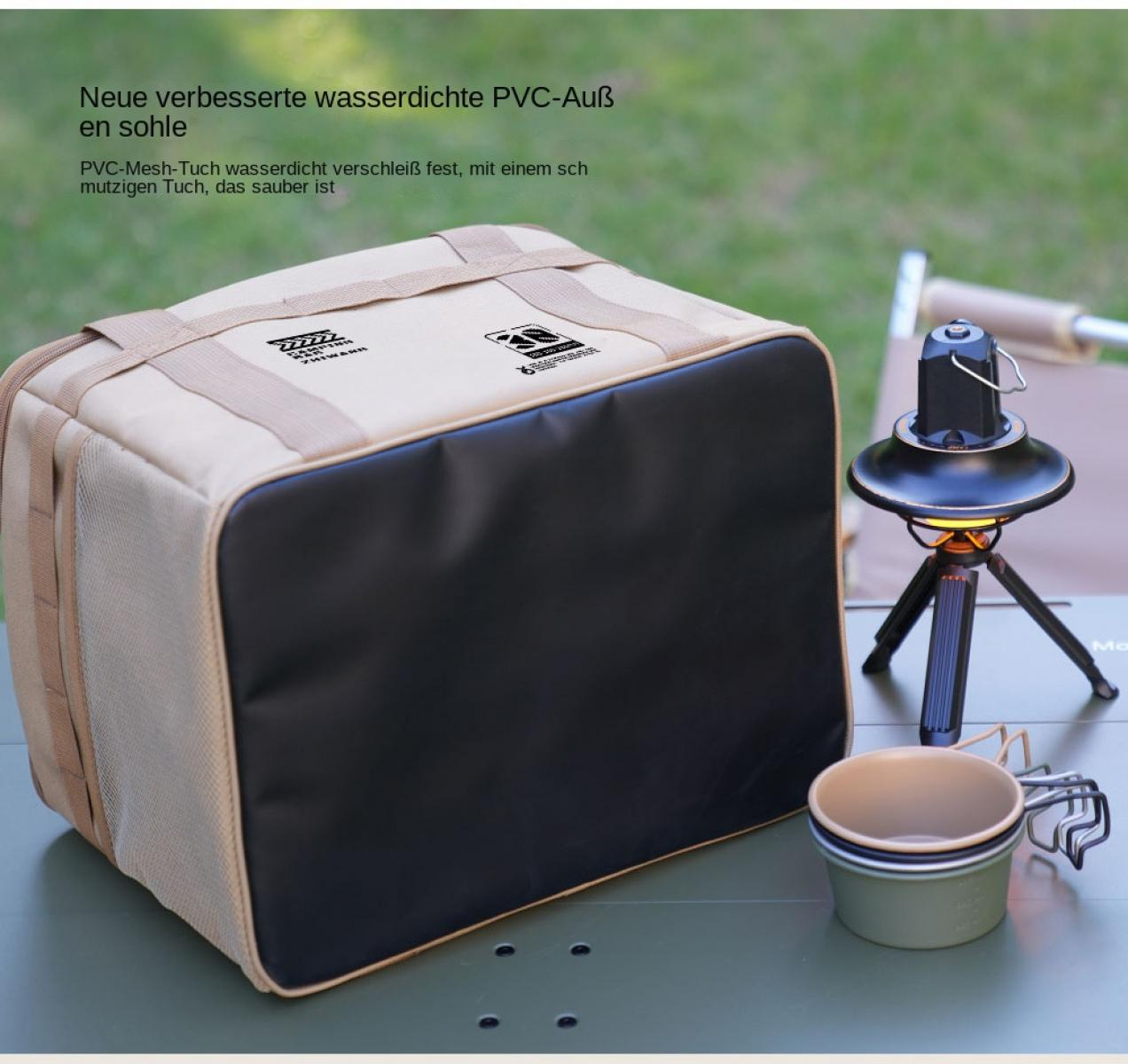 Beige Tasche mit schwarzem Einsatz, Campinglaterne und Tasse auf Tisch.