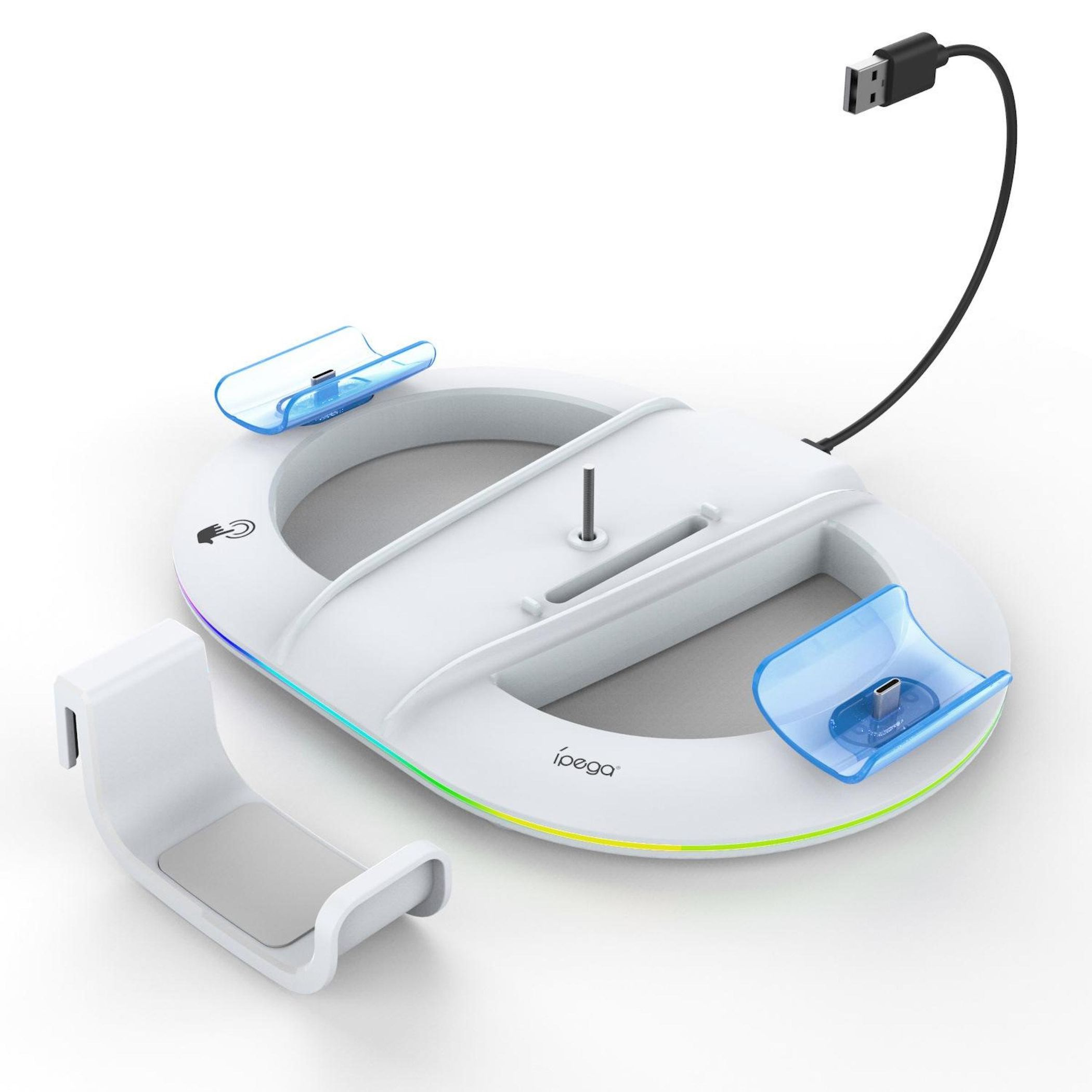 Base de carga blanca con detalles azules y cable USB, cargando mandos.