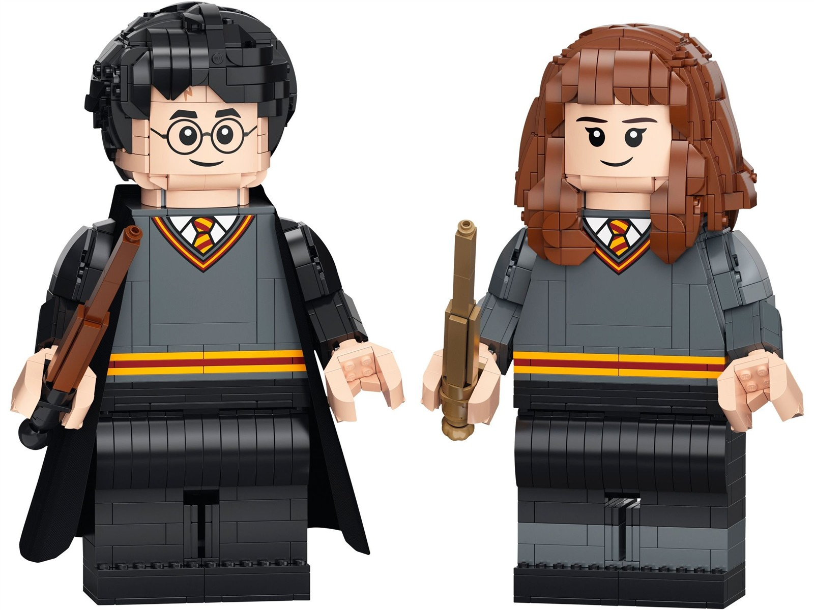 Zwei Lego-Figuren von Harry Potter und Hermine Granger mit Zauberstäben.