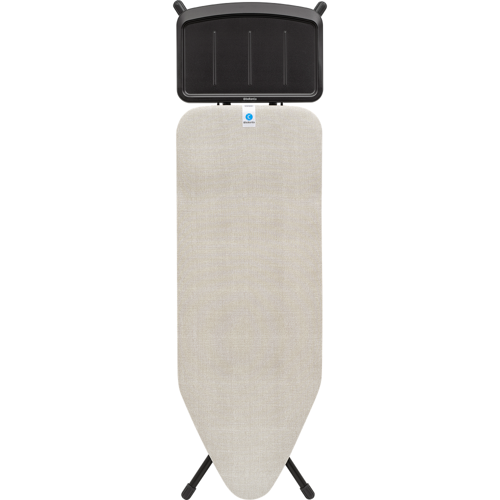 A light beige ironing board with a black metal frame and an iron rest.