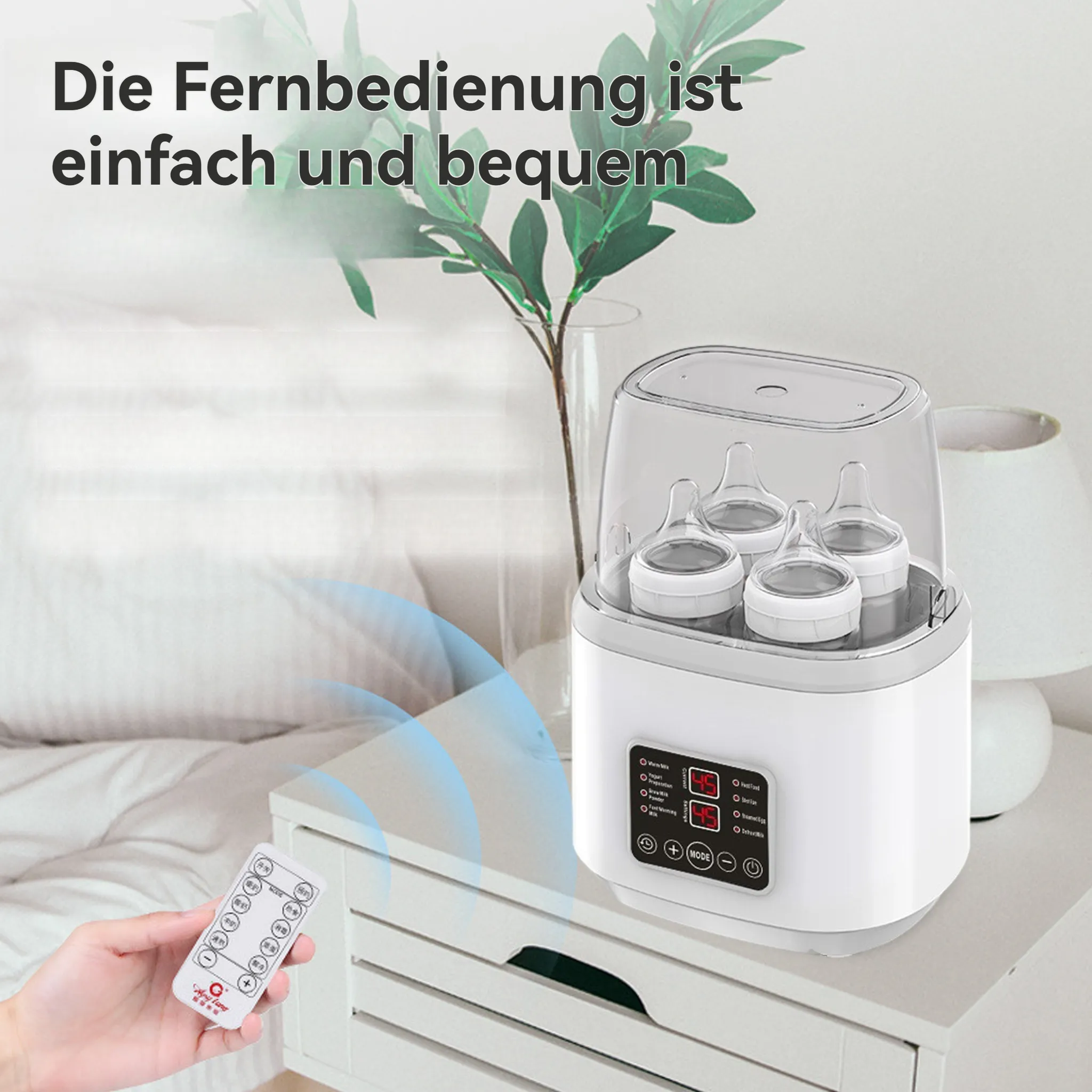 Ein Babyflaschenwärmer mit Fernbedienung steht auf einem Nachttisch.