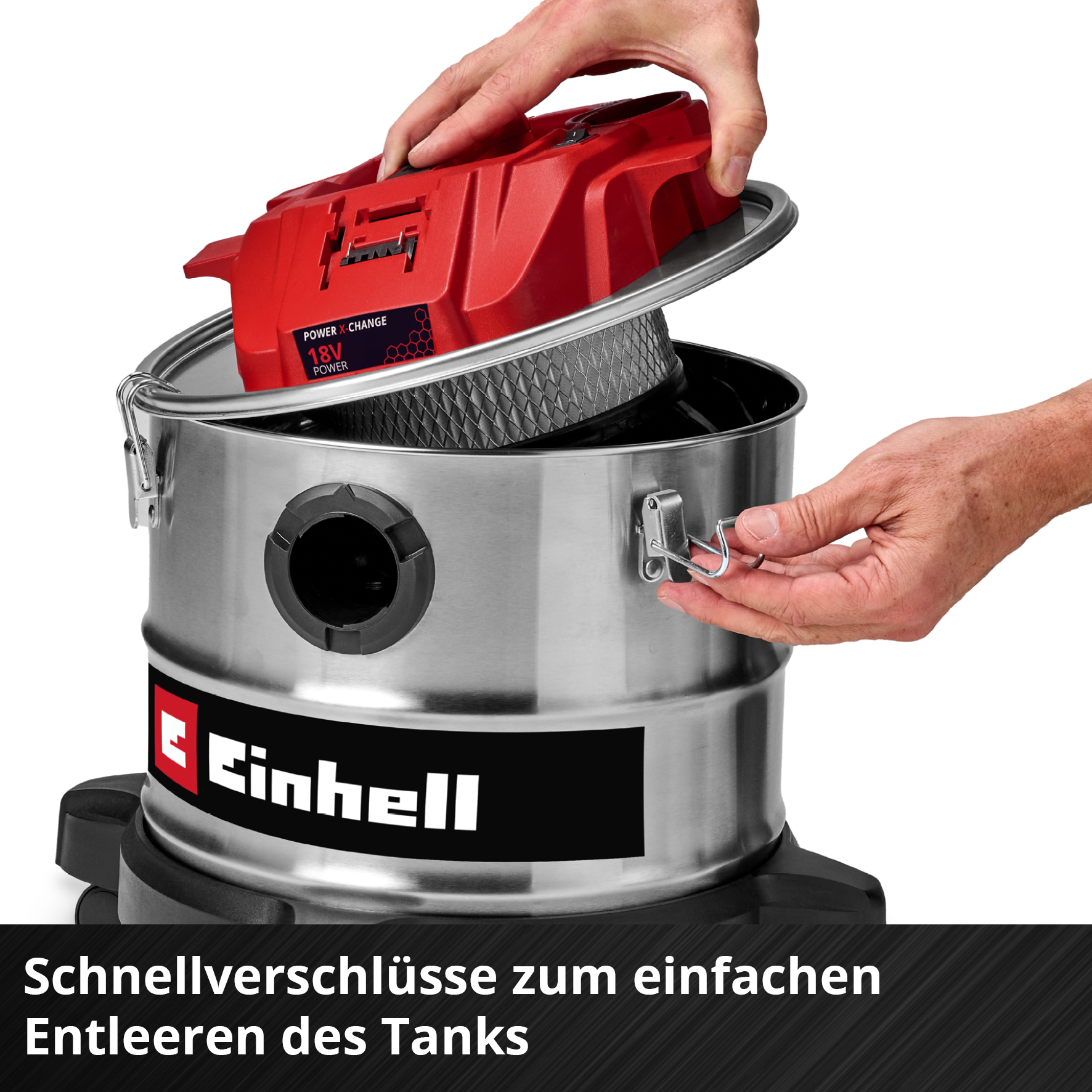 Personne retire une batterie rouge 18V du réservoir d'aspirateur.