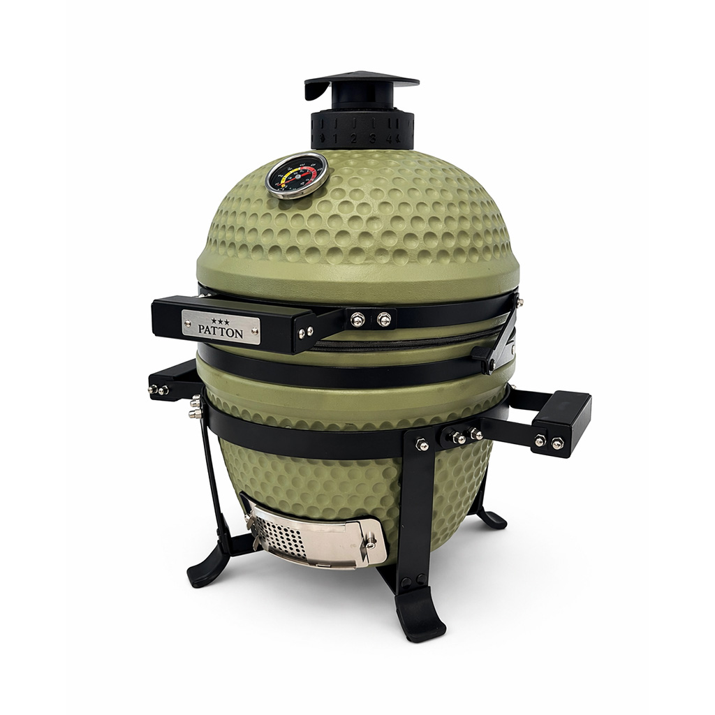 Grüne Keramikkugelgrill mit Thermometer und schwarzen Griffen auf Beinen.
