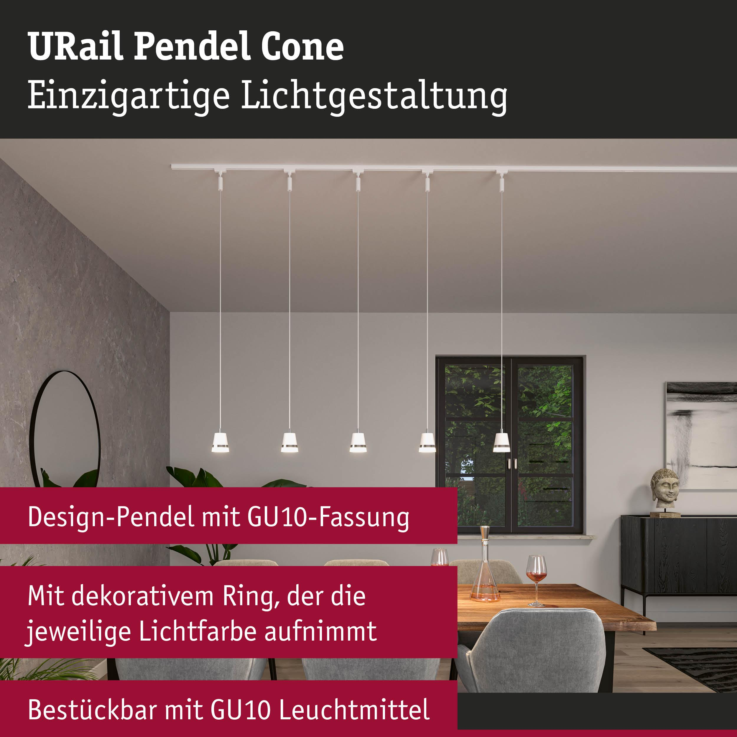 Moderne Pendelleuchten an einer Schiene über einem Esstisch.
