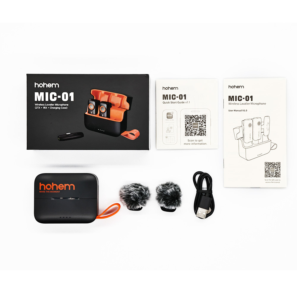 Zestaw mikrofonów krawatowych Hohem MIC-01 z etui ładującym, instrukcjami i akcesoriami.