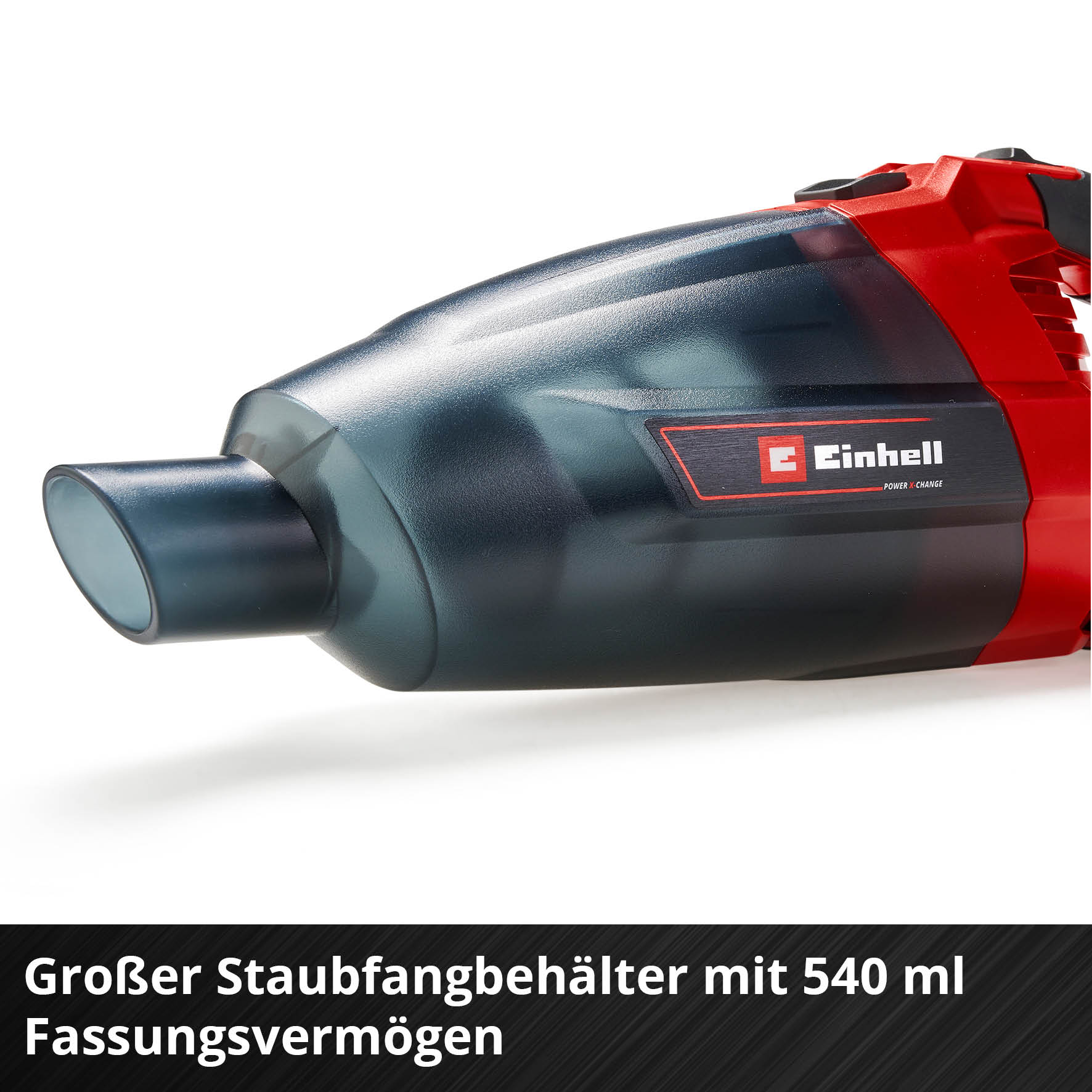 Un aspirateur à main rouge et noir avec un bac à poussière transparent.