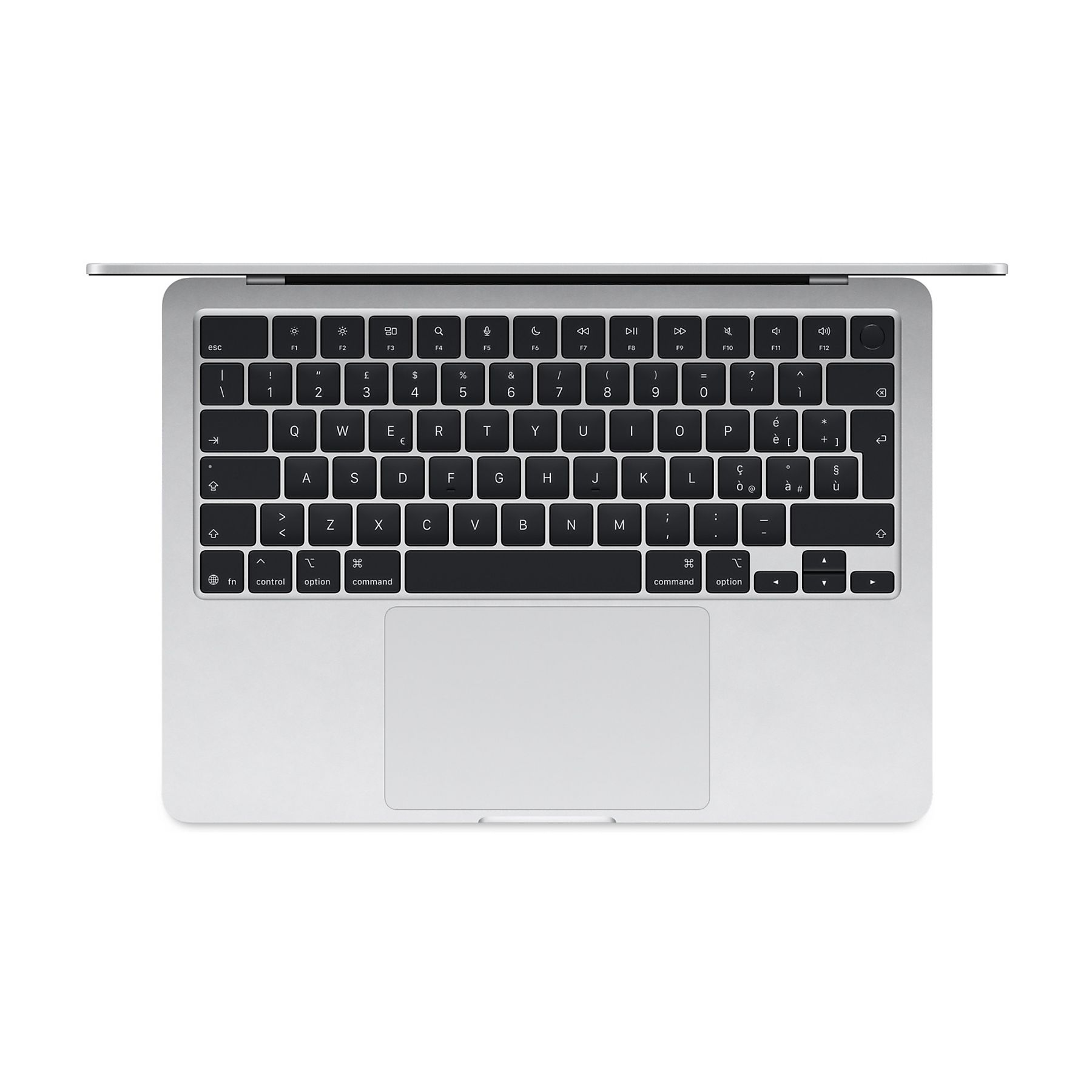 Un laptop argentato aperto con tastiera retroilluminata e trackpad.