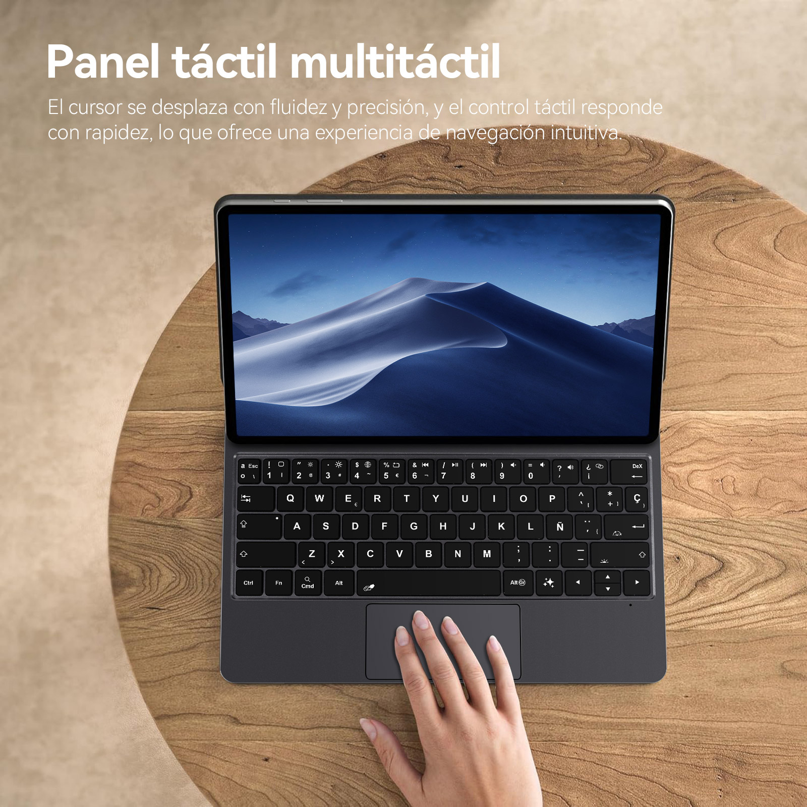 Una tableta con teclado y panel táctil sobre una mesa de madera.