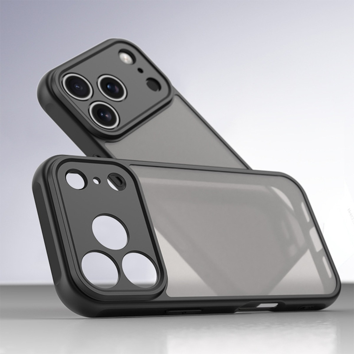 Due custodie nere per telefono con retro trasparente, una sull'altra.